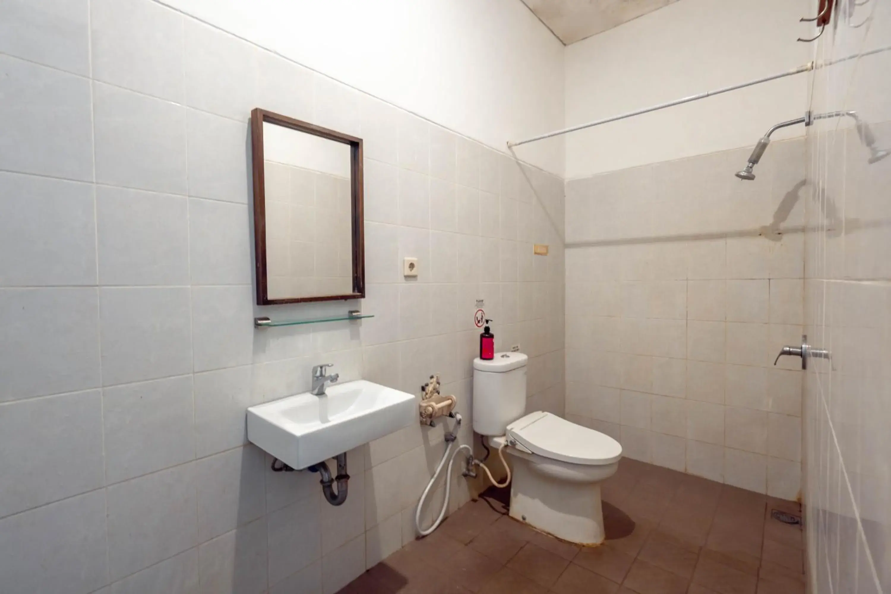 Bathroom in RedDoorz near Pantai Sanur Bali