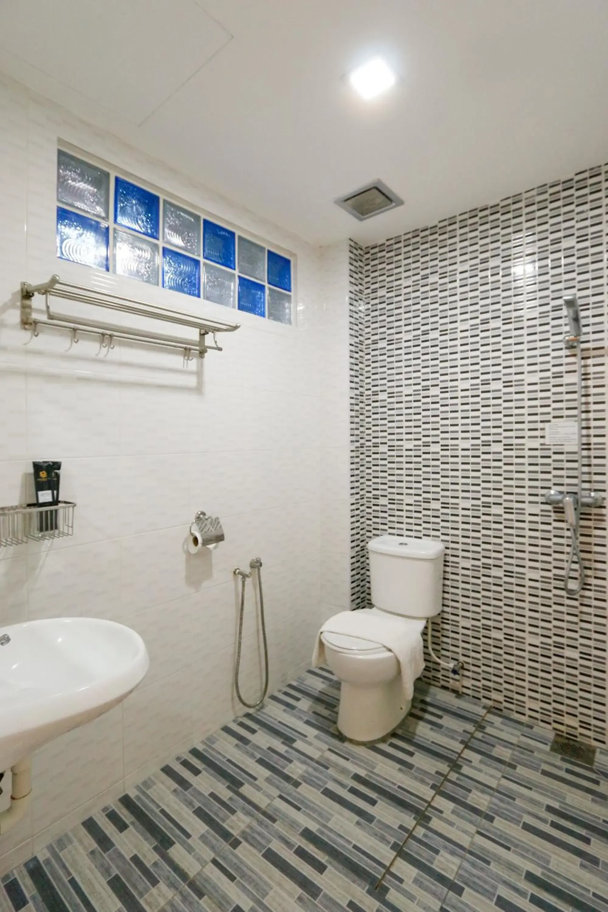 Toilet, Bathroom in Travelland Hotel