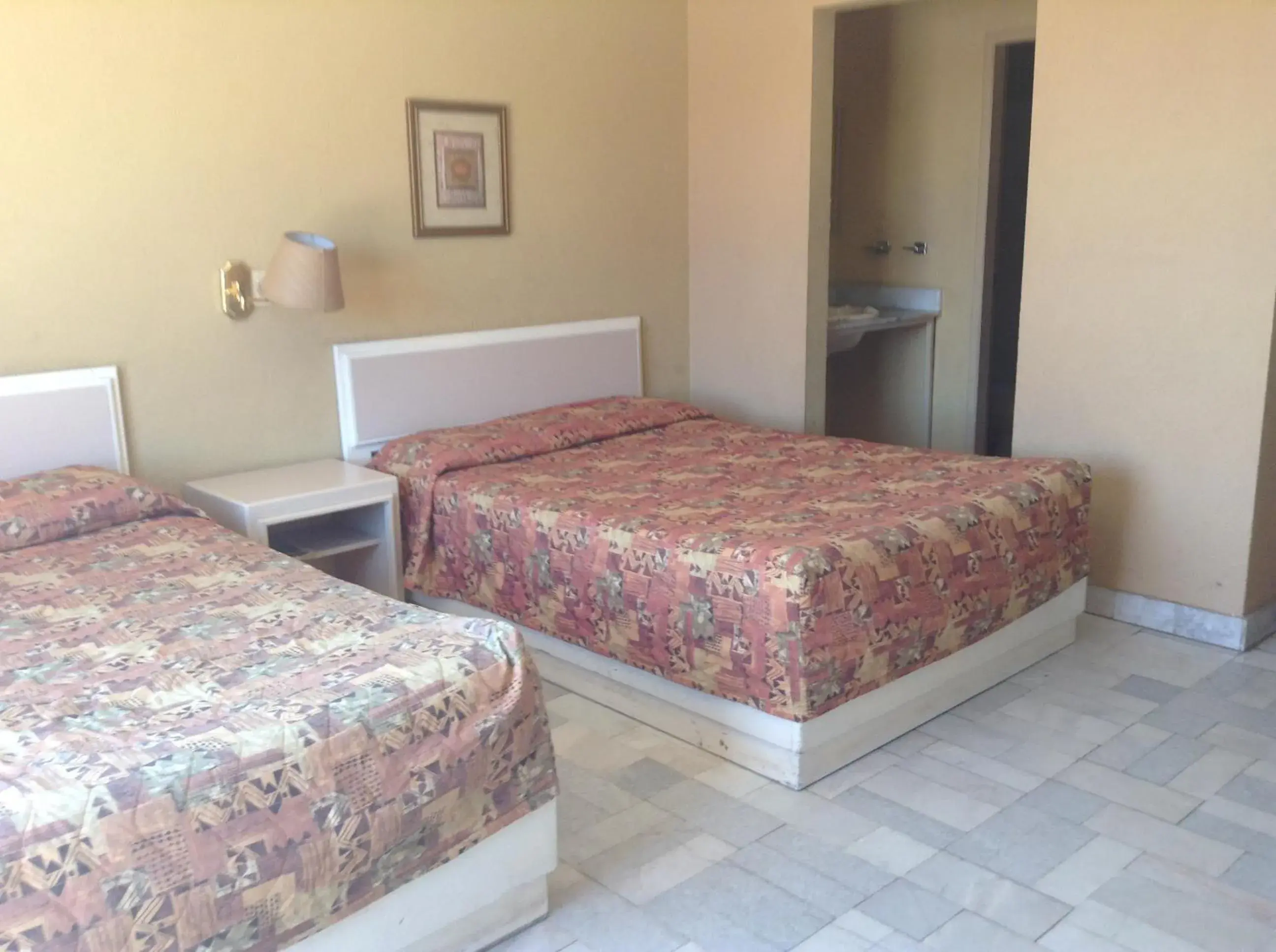 Photo of the whole room, Bed in Los Jitos Hotel & Suites