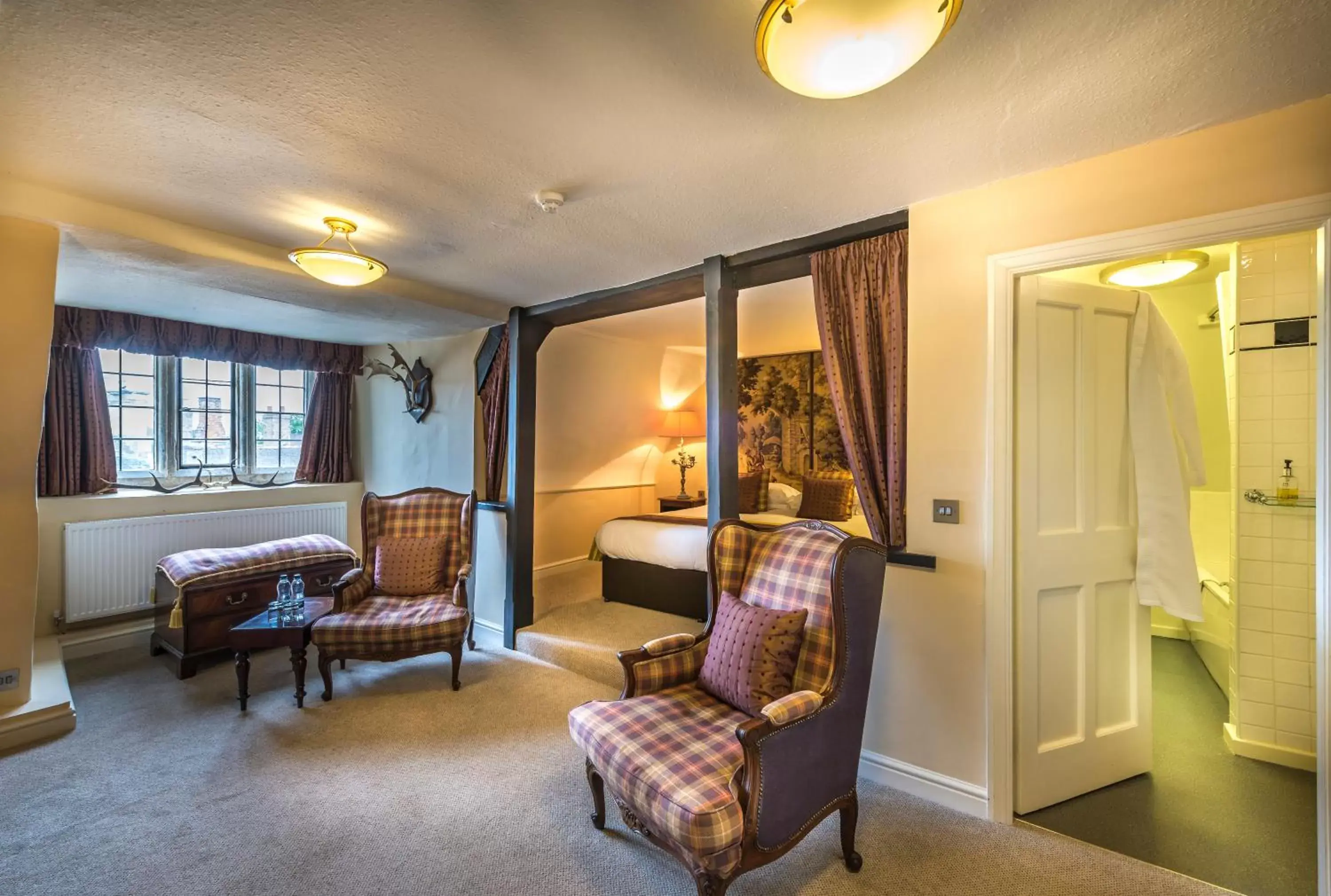 Bedroom, Seating Area in The Talbot Hotel, Oundle , Near Peterborough