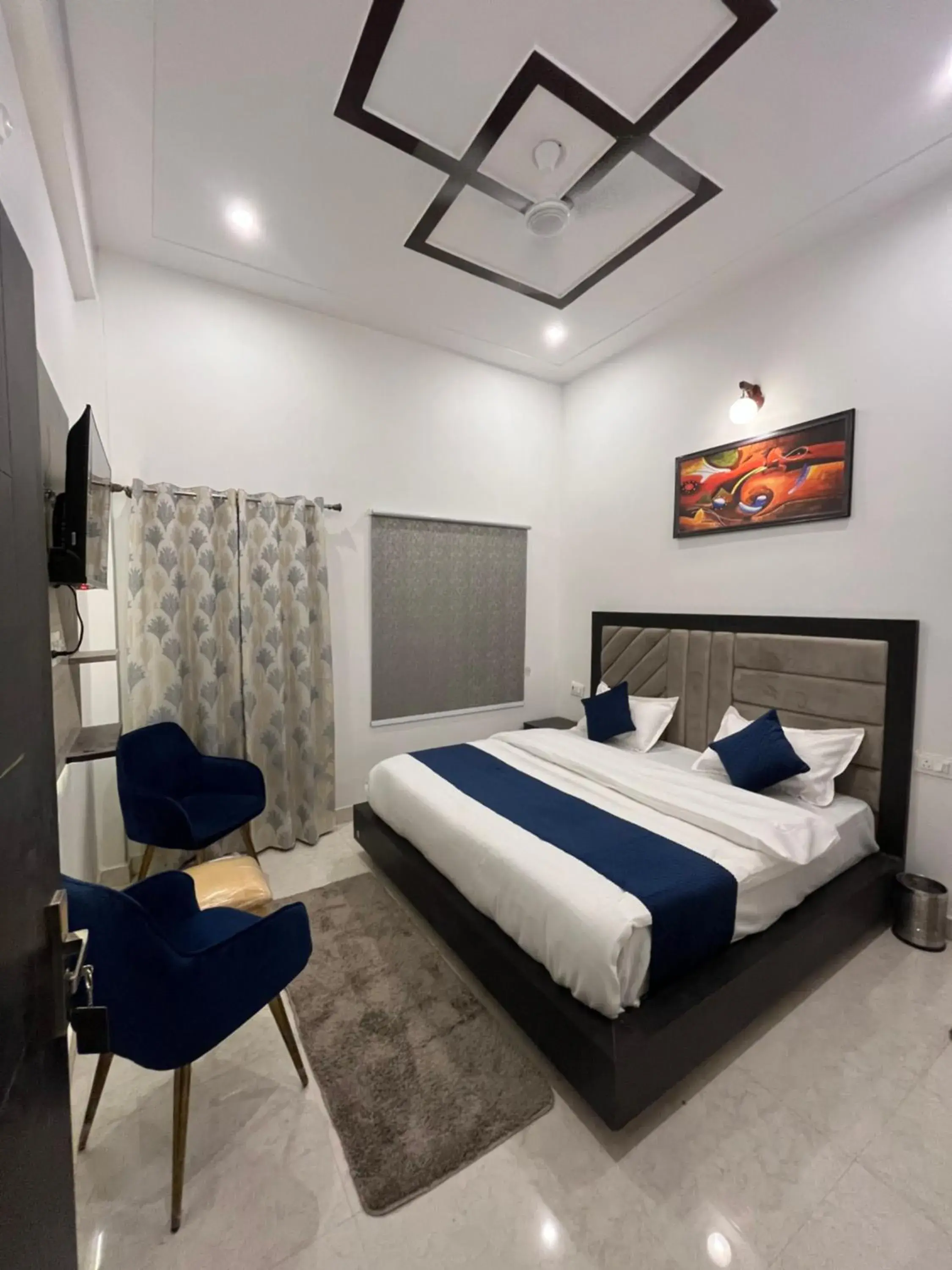 Deluxe Double Room (2 Adults + 1 Child) in The nines hotel & restro Deluxe Double Room (2 Adults + 1 Child) in The nines hotel & restro