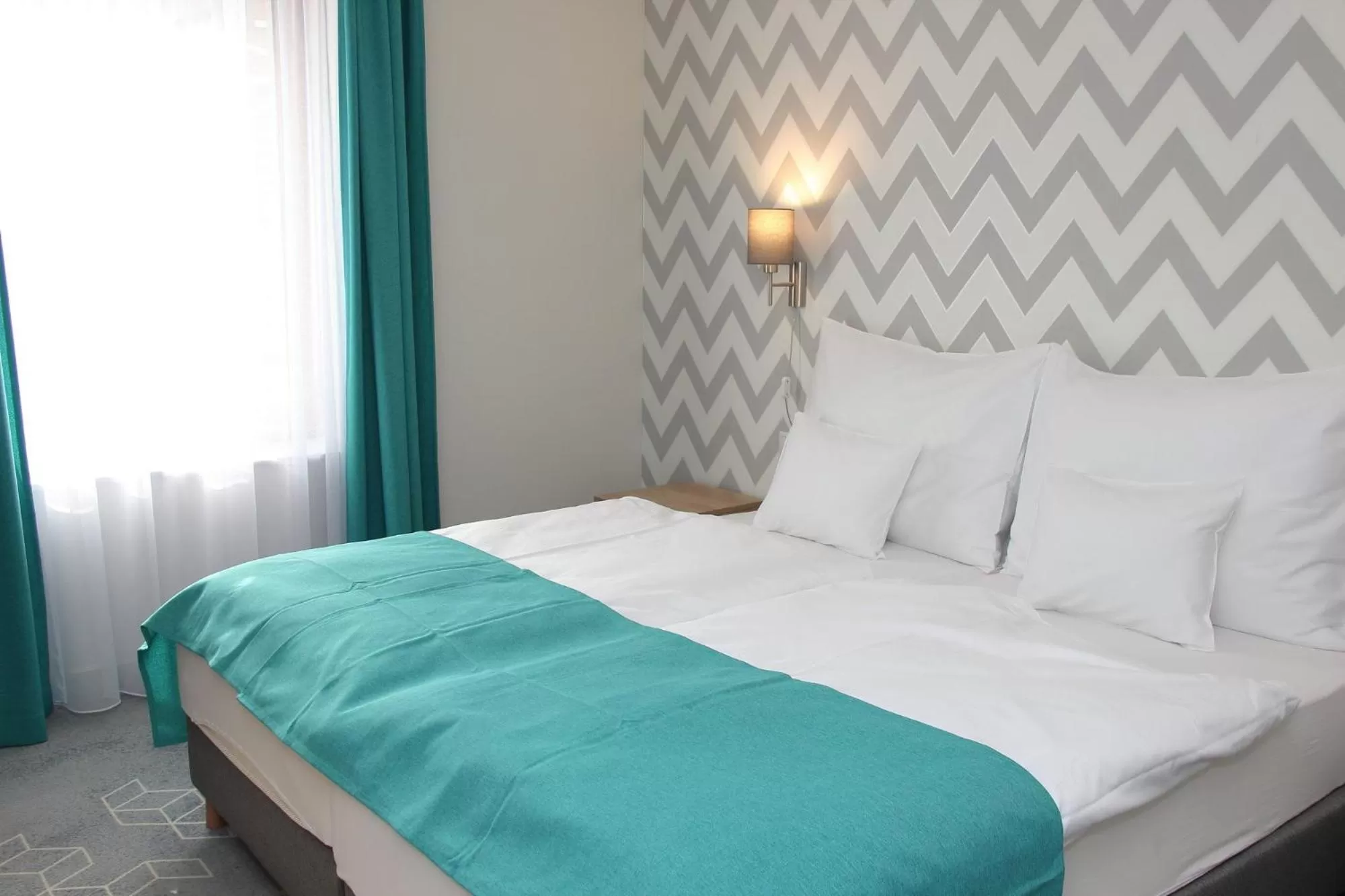 Bed in Hotel Adalbert Szent Tamás ház