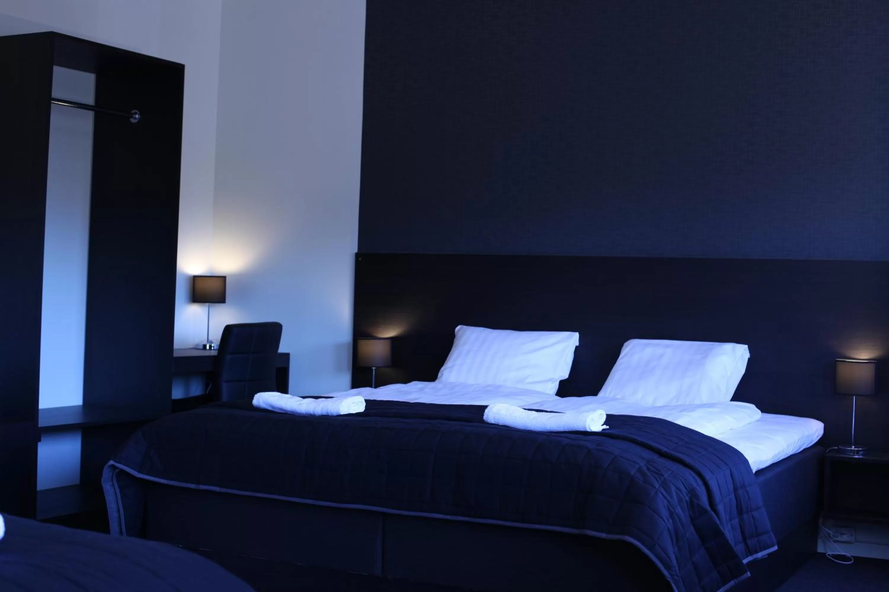 Photo of the whole room, Bed in Nacka Stadshotell