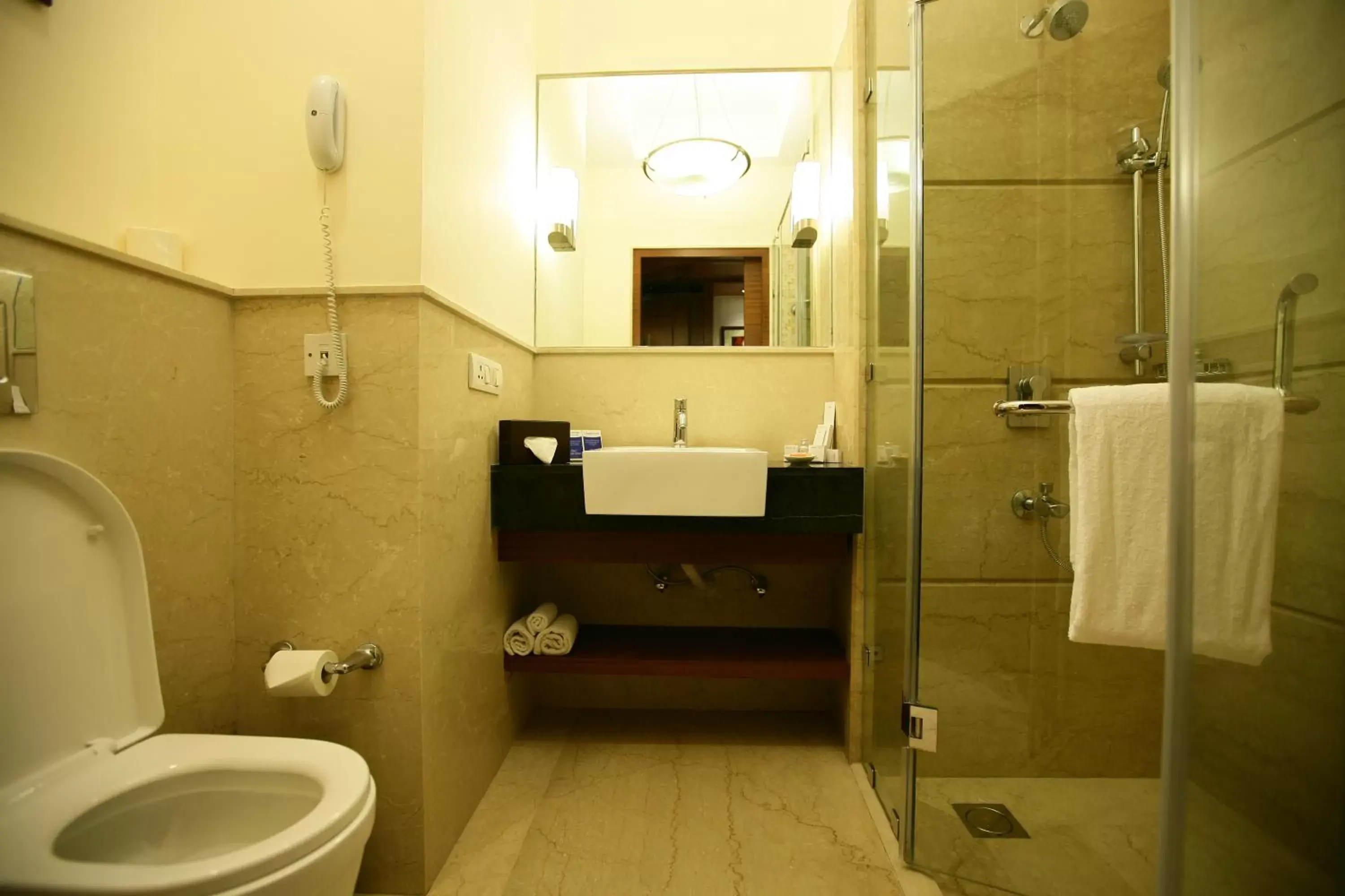 Bathroom in Muse Sarovar Portico Nehru Place