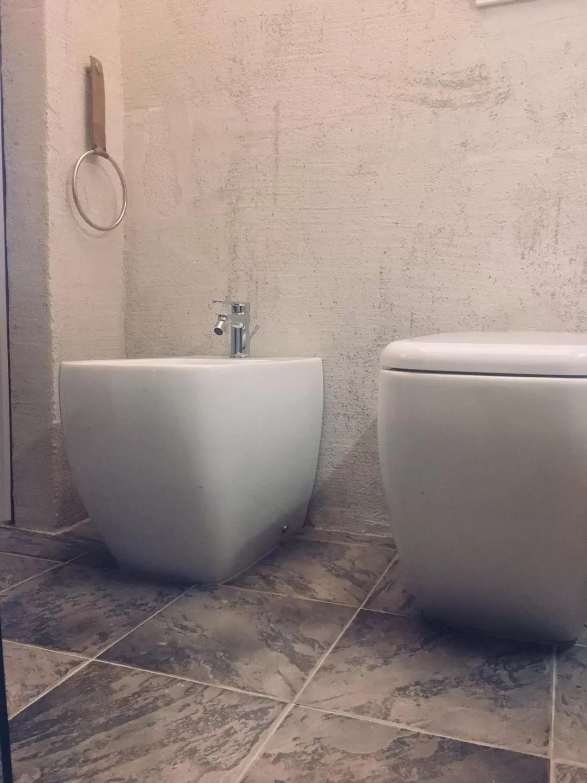 Toilet in Black Market Hotel