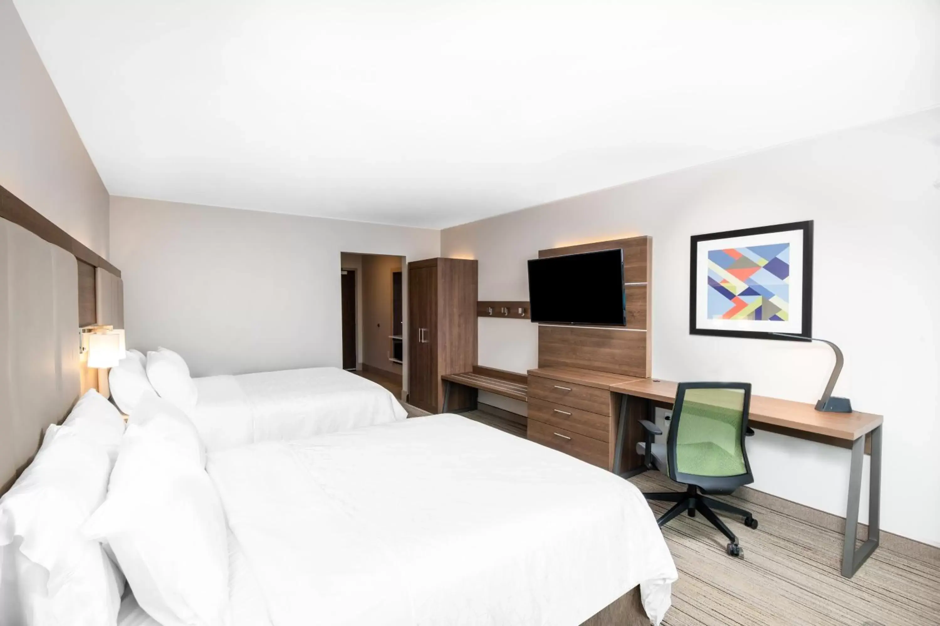 Photo of the whole room, TV/Entertainment Center in Holiday Inn Express & Suites - Phoenix - Airport North, an IHG Hotel