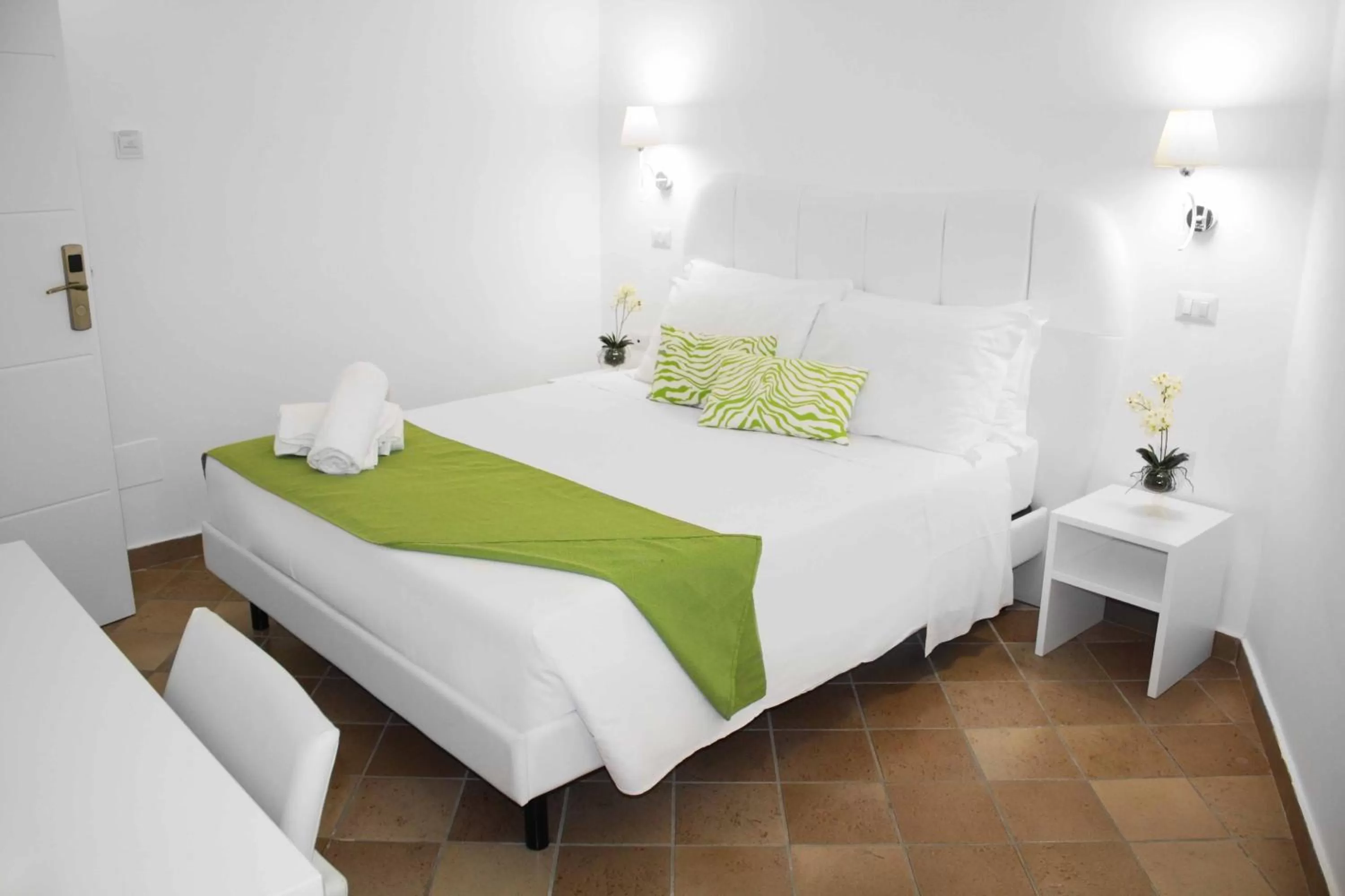 Bed in Roma Resort Colosseum