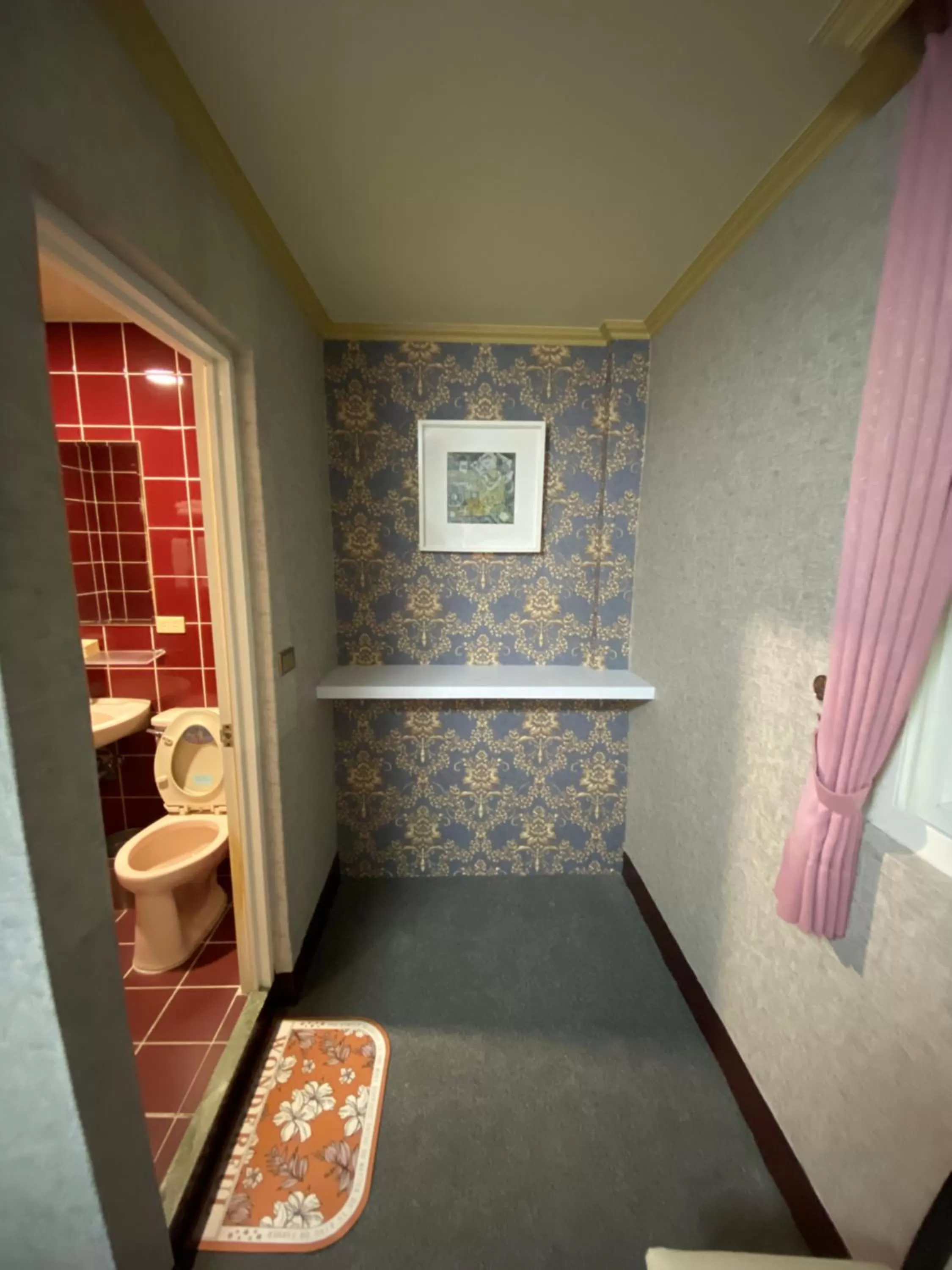 Photo of the whole room in Rich Zone Hotel