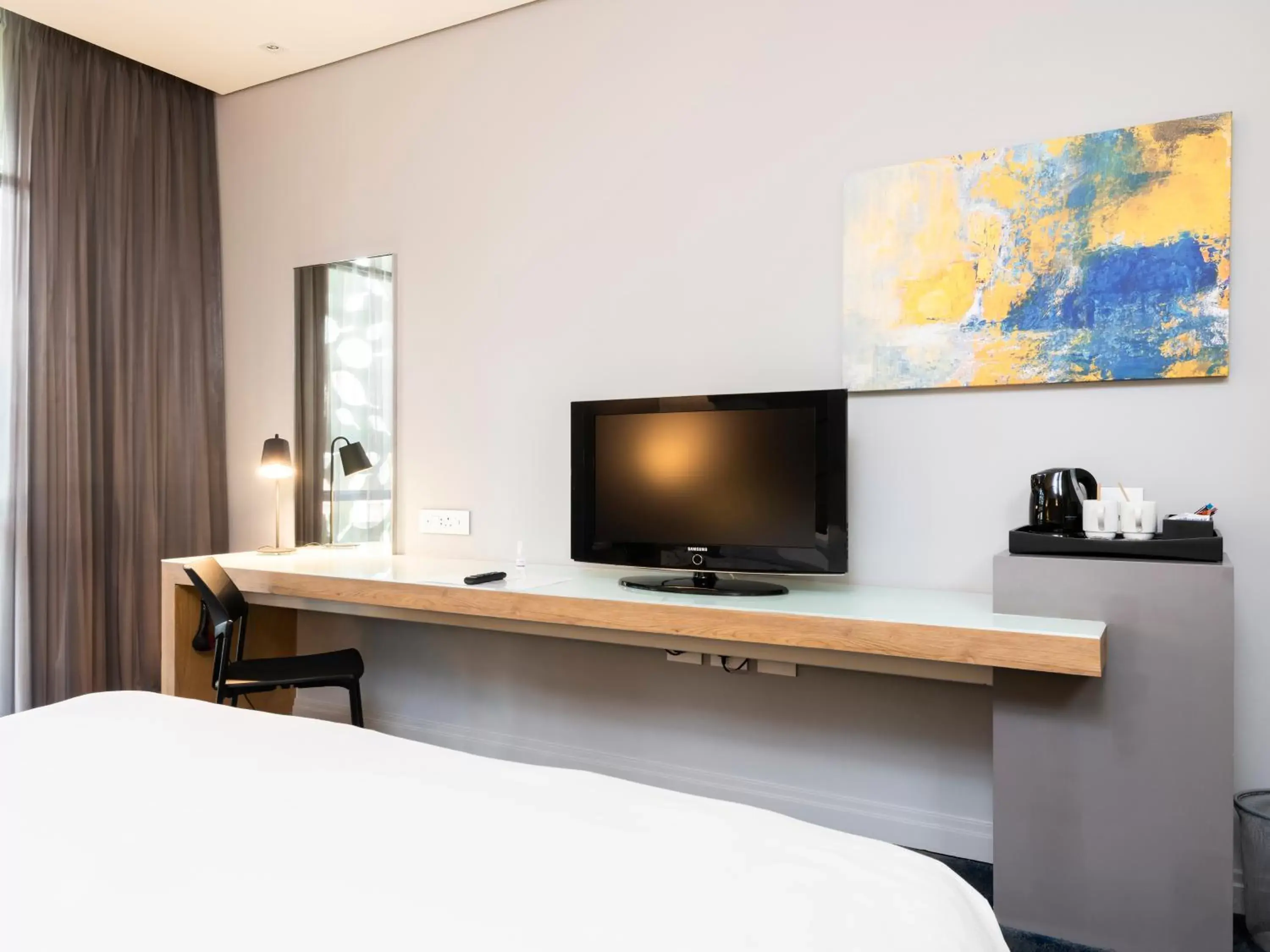 TV and multimedia, TV/Entertainment Center in aha Gateway Hotel Umhlanga