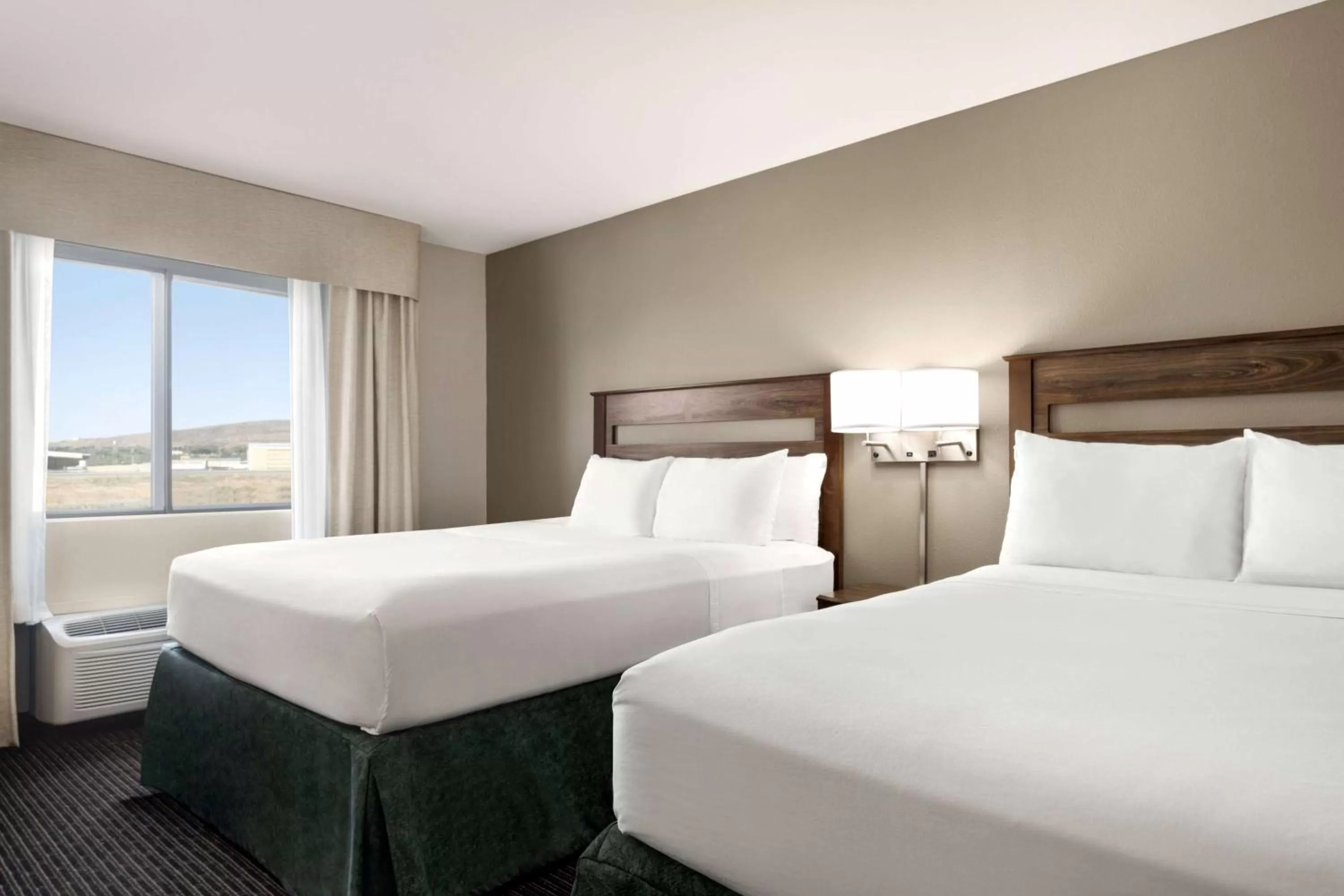 Photo of the whole room, Bed in Baymont by Wyndham Rawlins