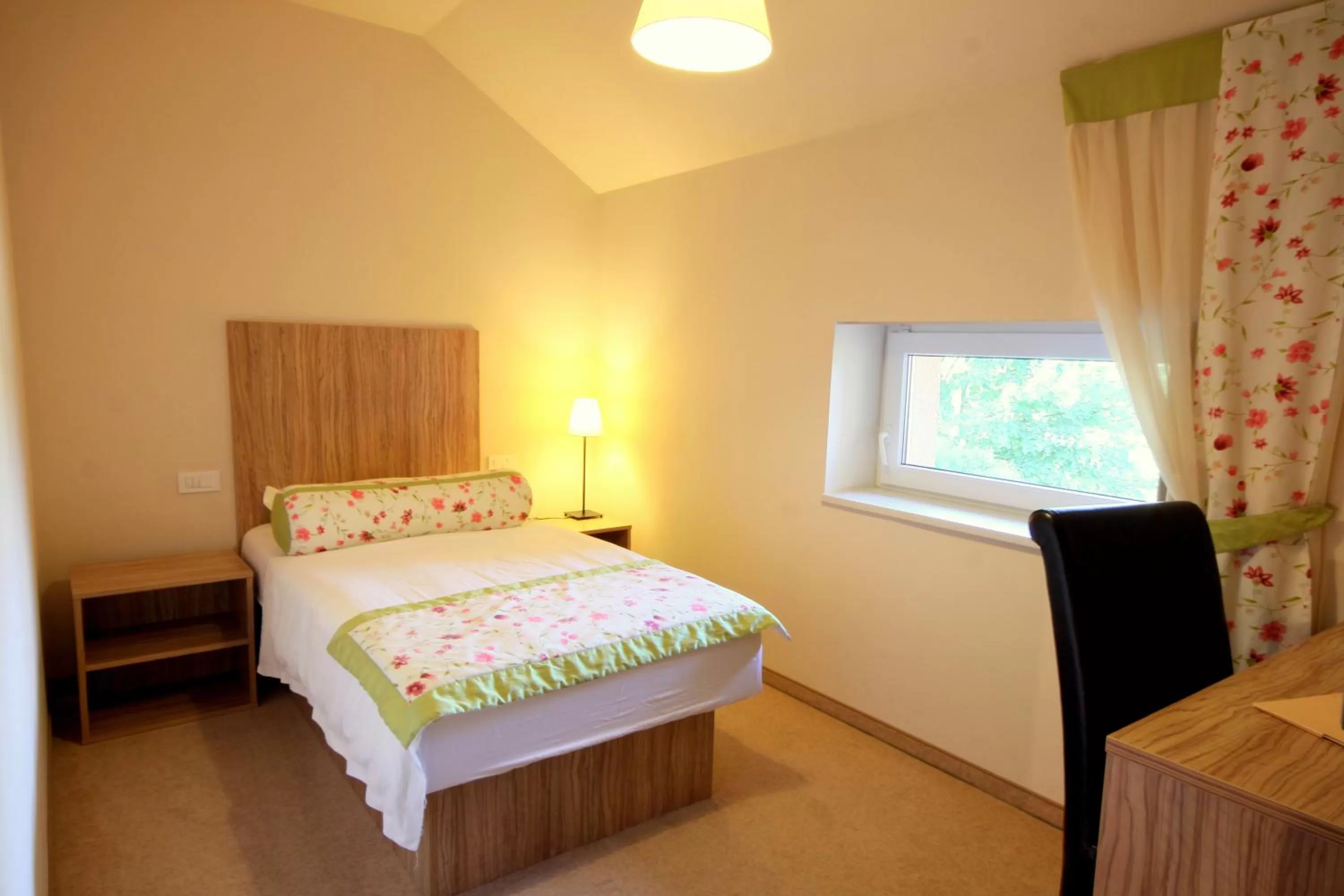 Bed in Ambient Hotel