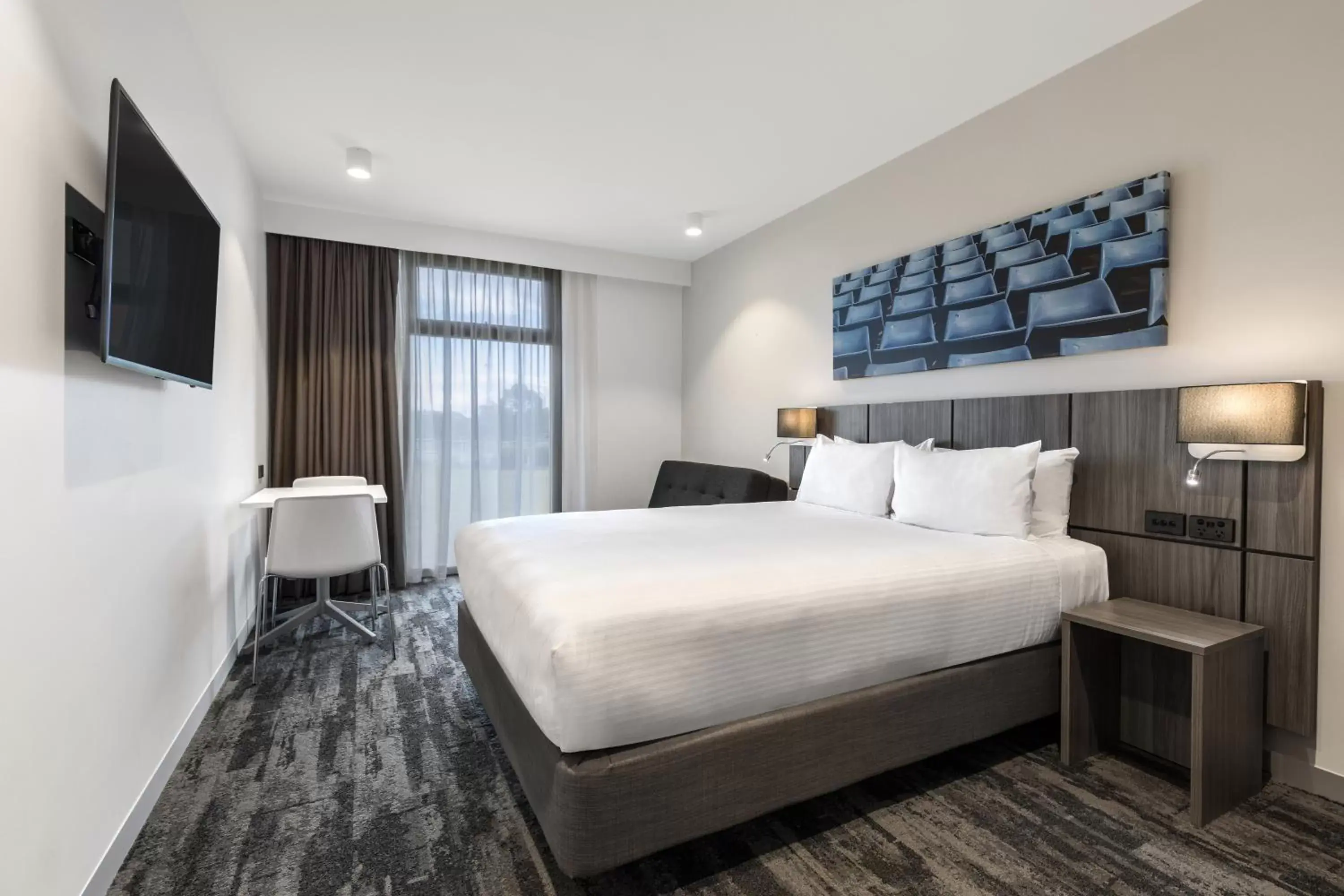 Bed in Mercure Sydney Blacktown