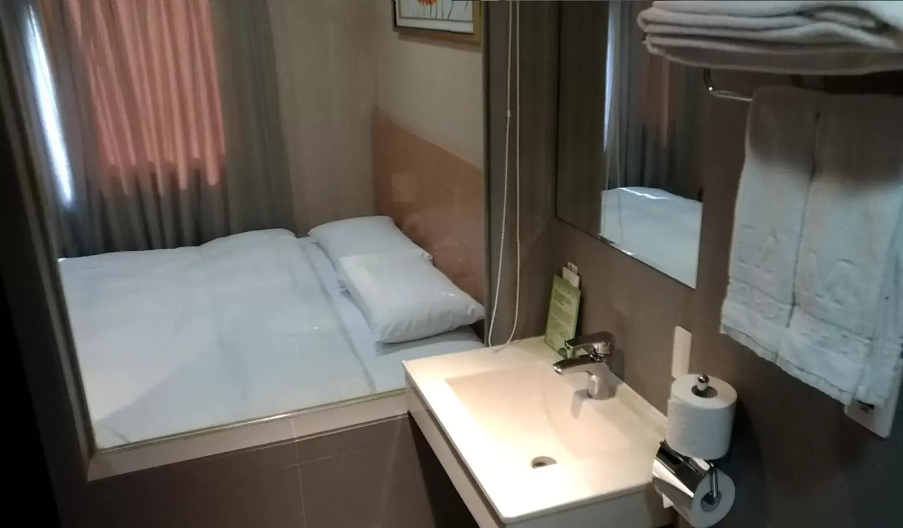 Bed, Bathroom in The Metro Hotel Taichung