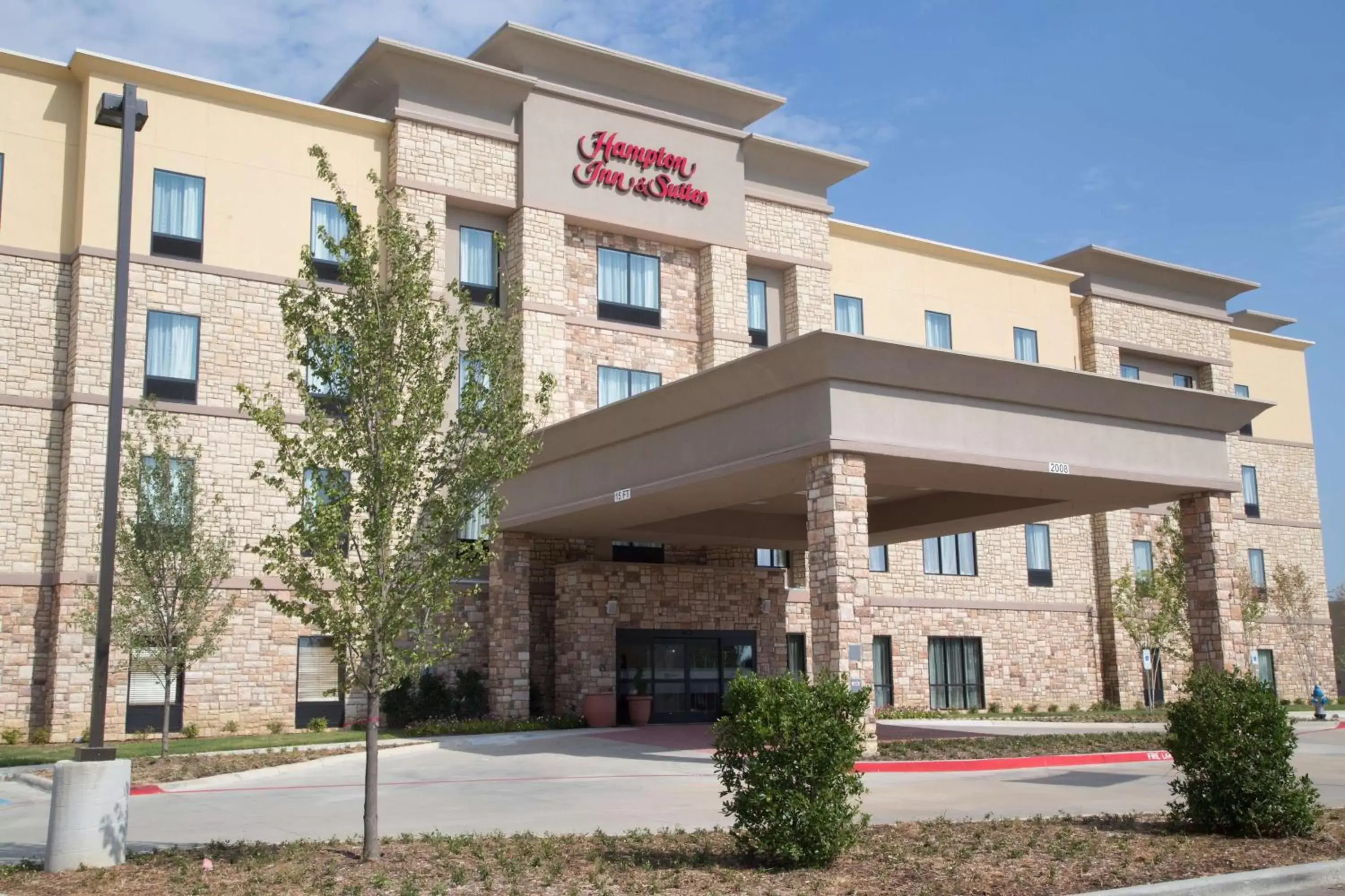 Property Building in Hampton Inn and Suites by Hilton McKinney