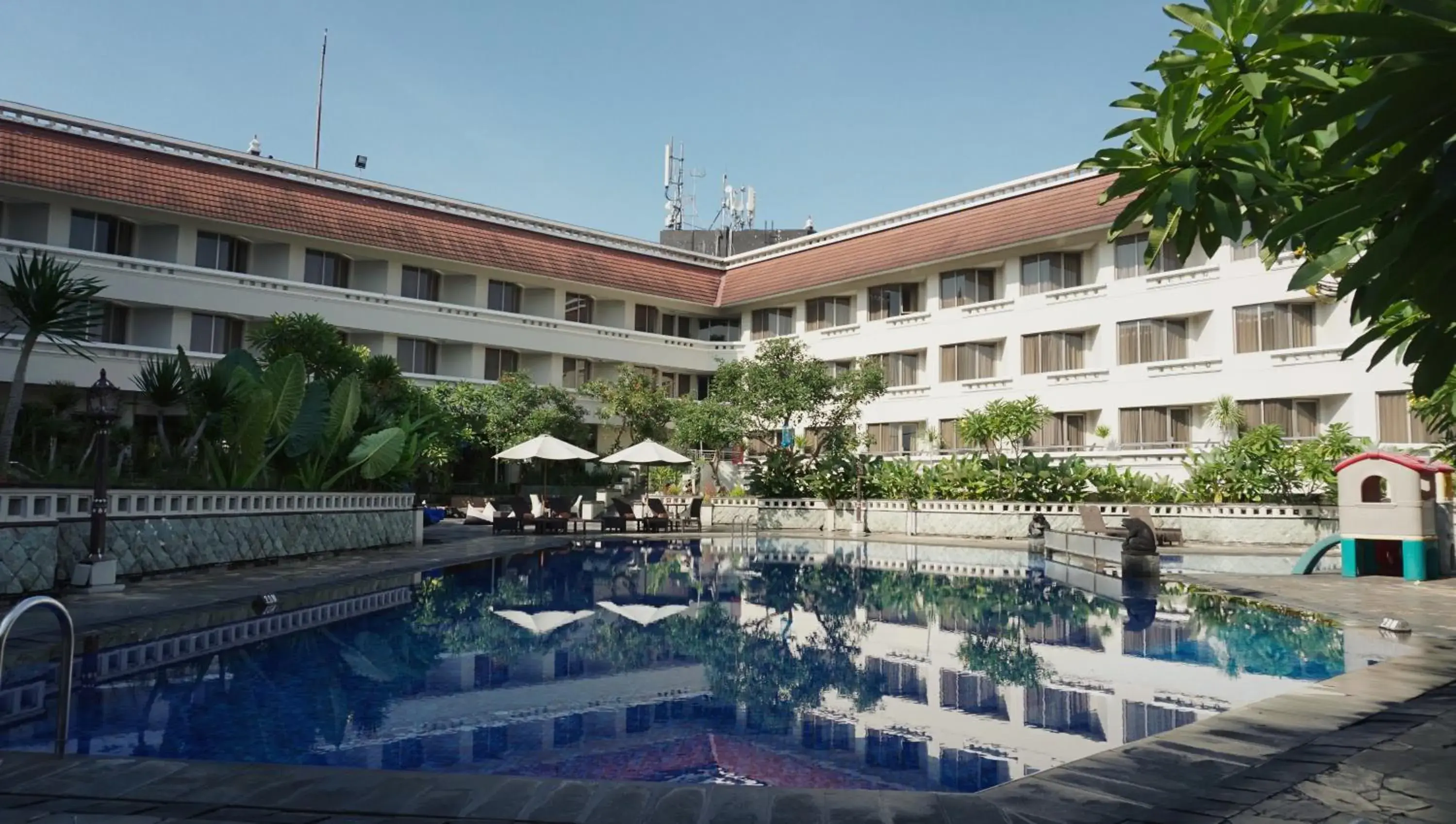 Property building, Swimming Pool in Hotel Santika Premiere Jogja