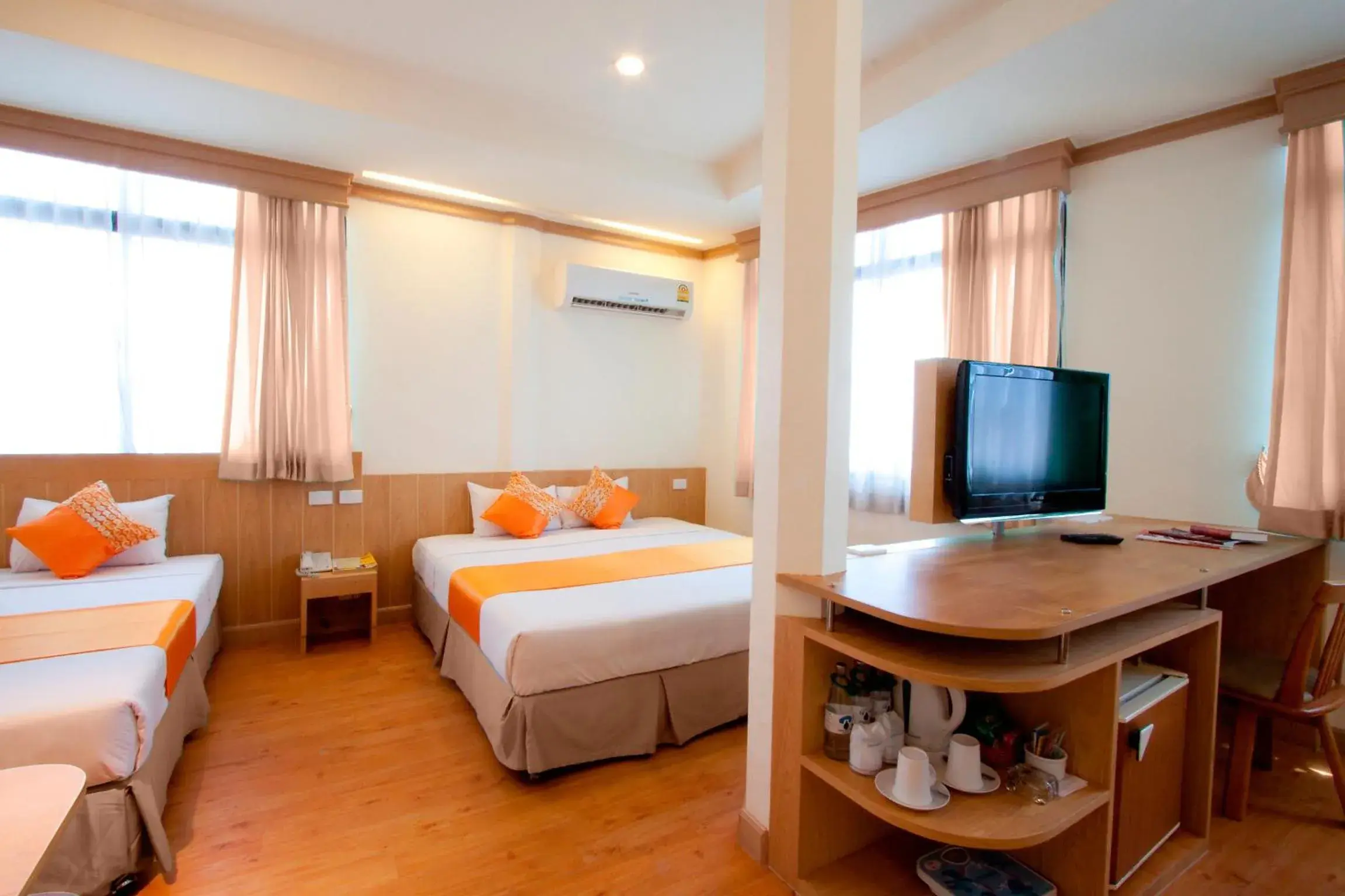 Bed, TV/Entertainment Center in China Town Hotel - SHA Plus Certified