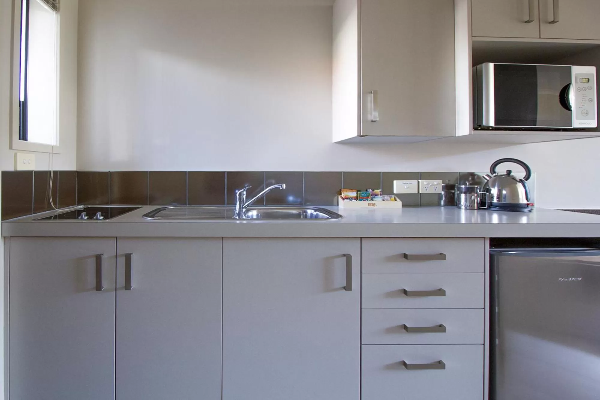 Kitchen or kitchenette in Alpine Lake Motel