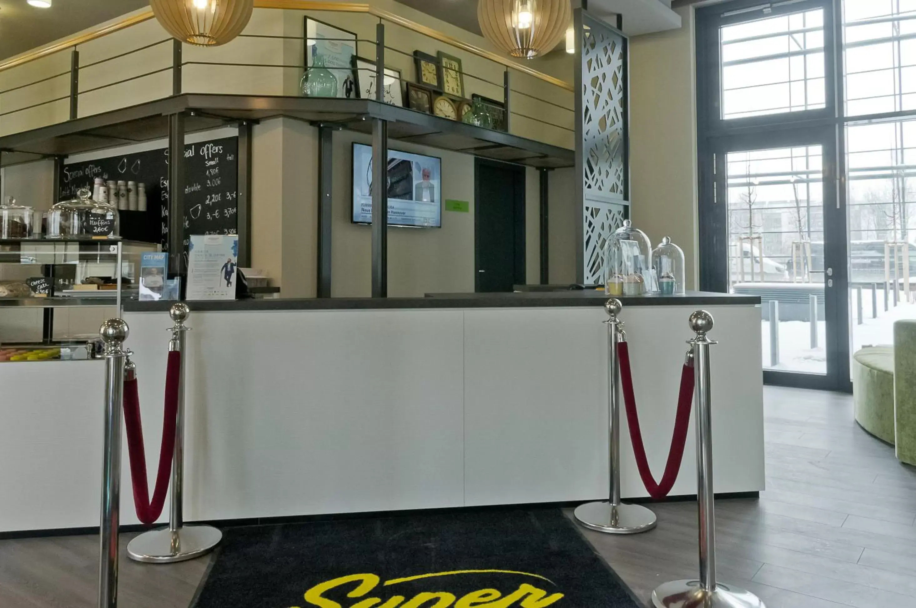 Lobby or reception in Super 8 by Wyndham Munich City West