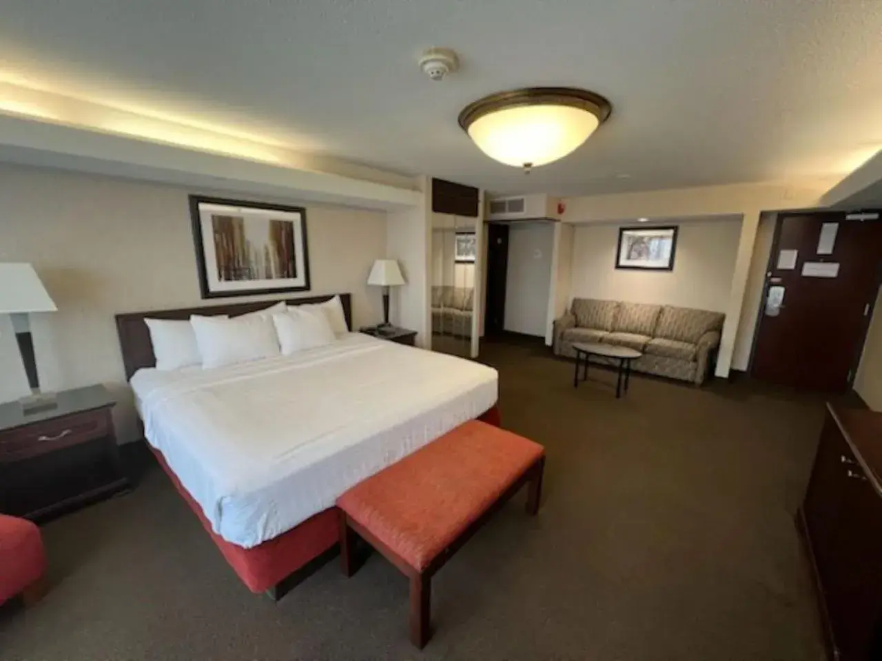 Bed in Hotel Lotus Kansas City Merriam