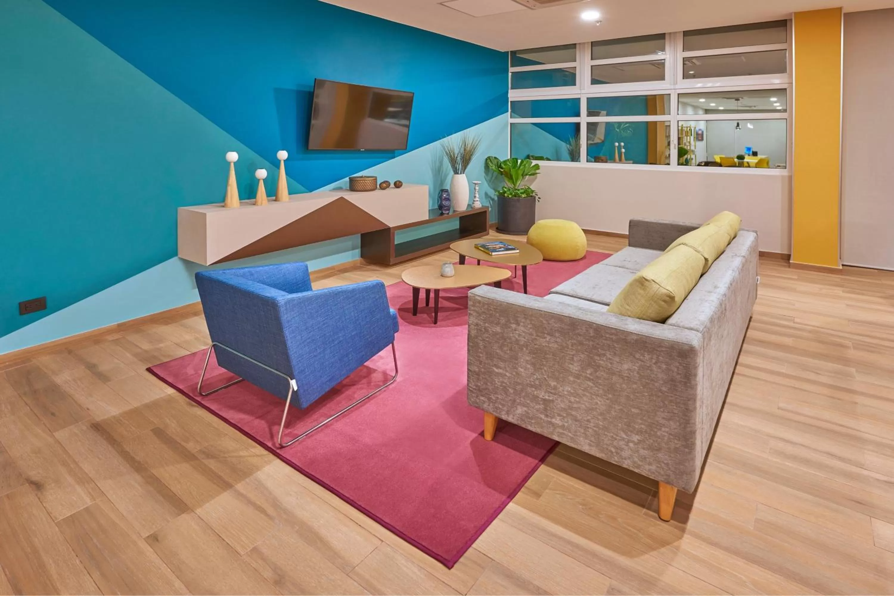 Living room in City Express Suites by Marriott Cancún Aeropuerto