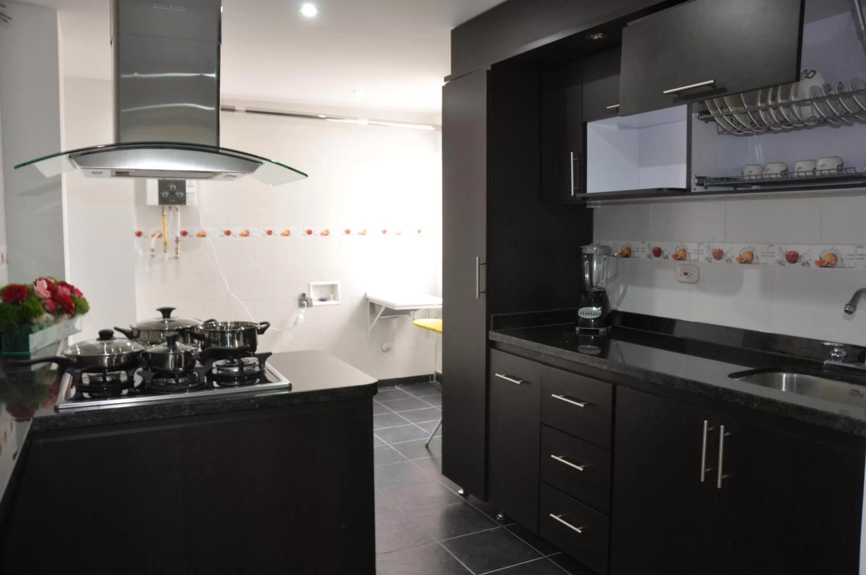 Kitchen or kitchenette in Apartamentos Plaza Modelia