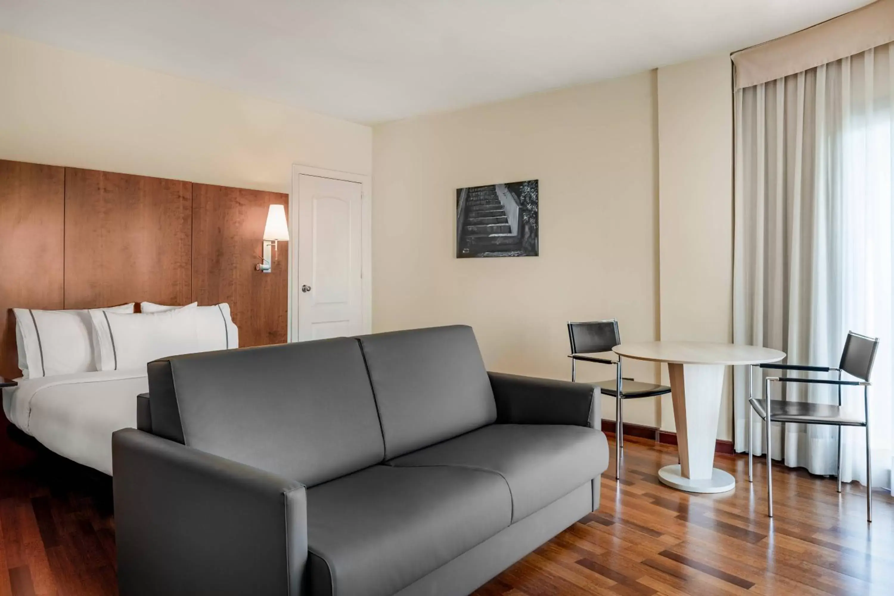 Photo of the whole room, Seating Area in AC Hotel La Línea by Marriott