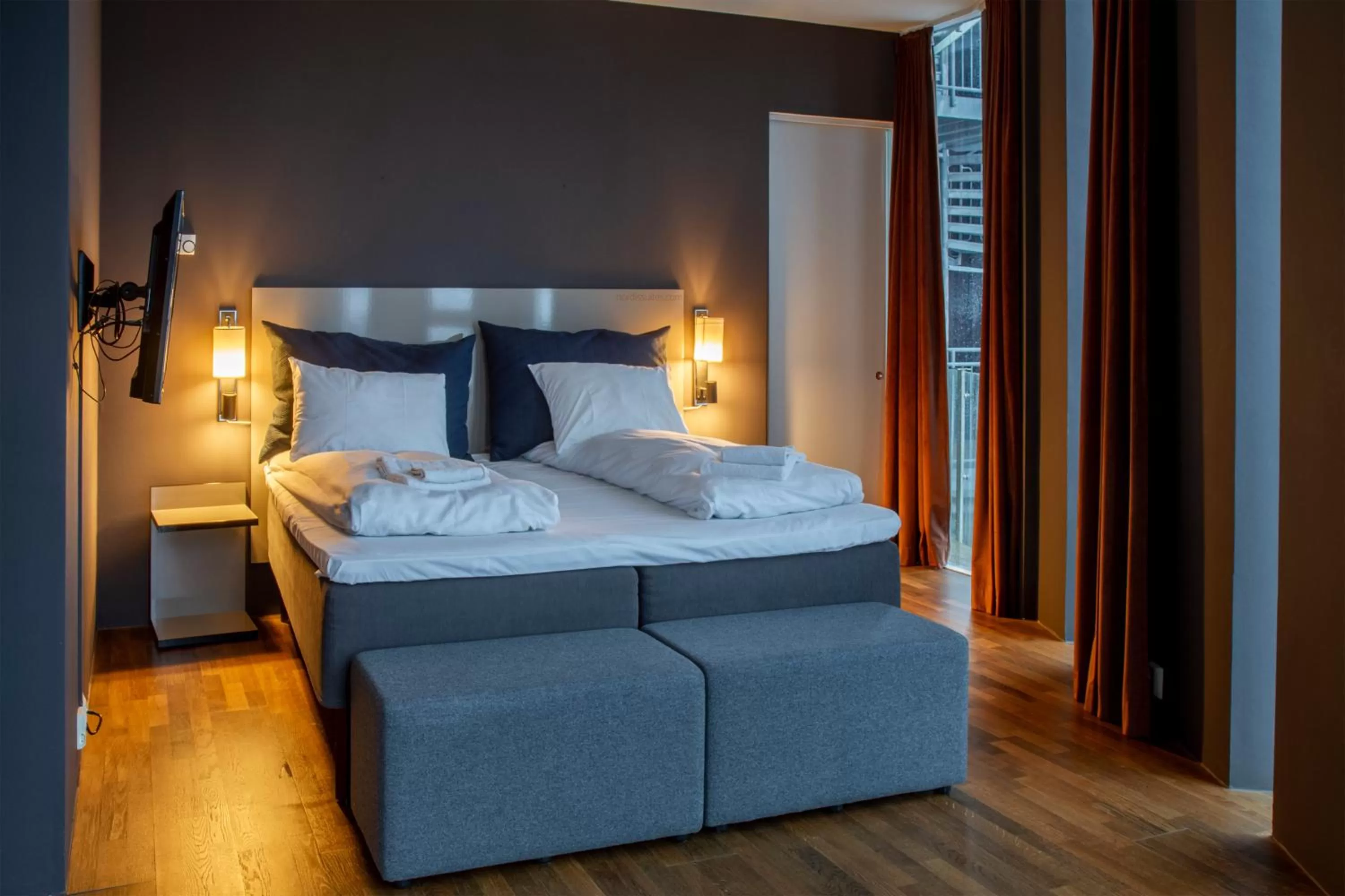 Bed in Nordis Apartments