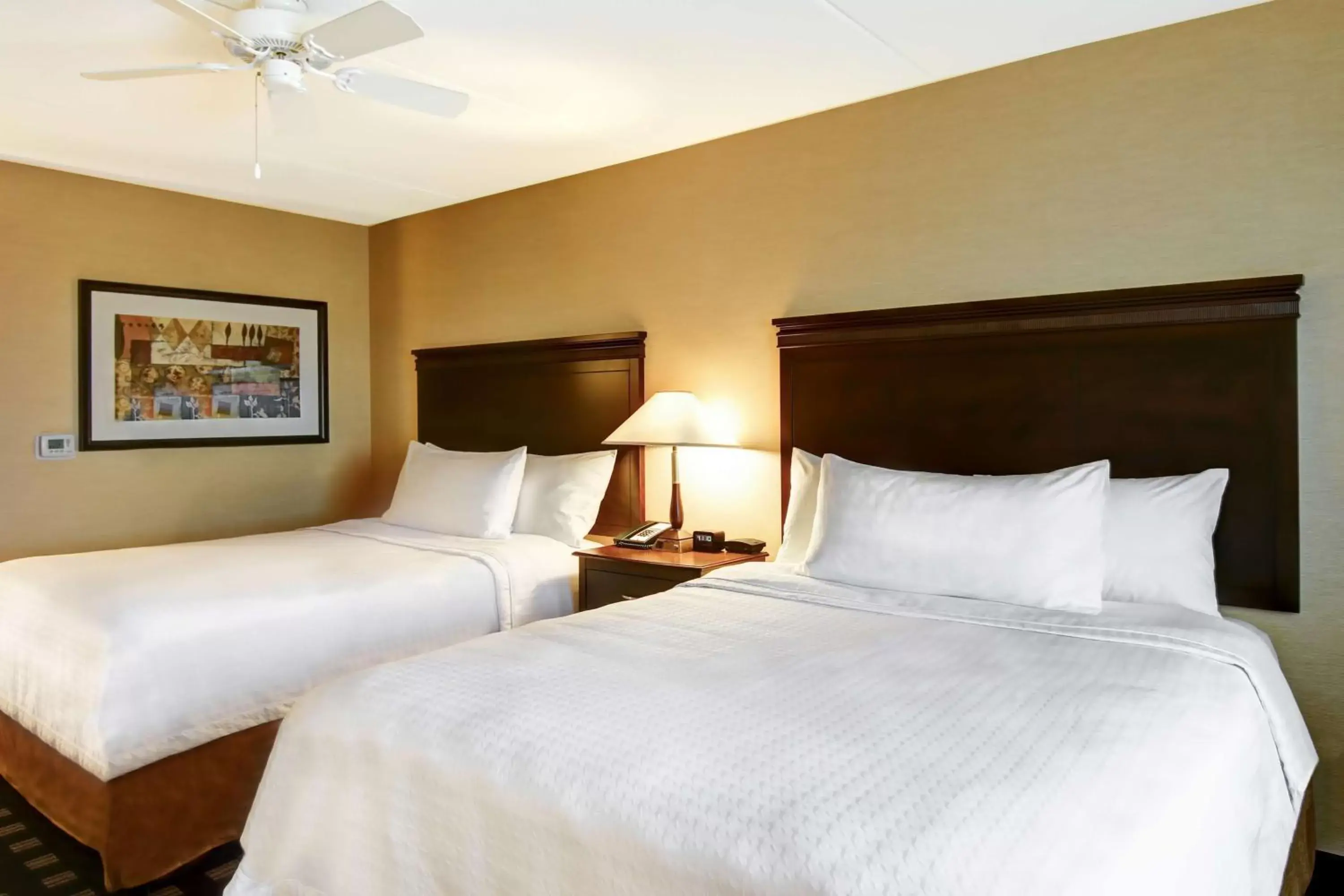 Bed in Homewood Suites by Hilton Toronto Airport Corporate Centre