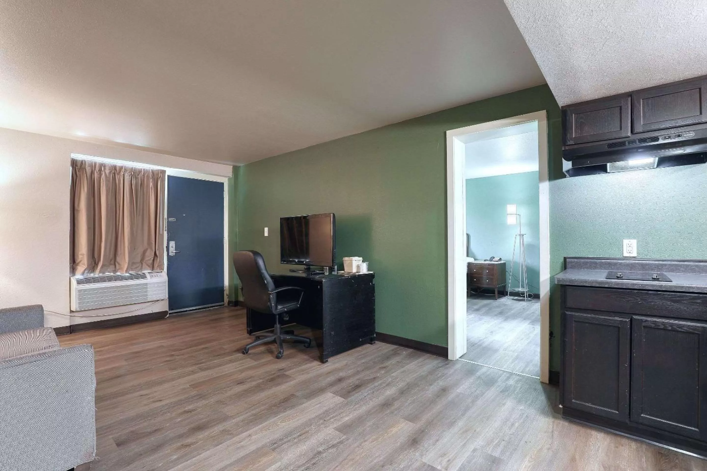 Bedroom in Suburban Studios Neenah-Appleton