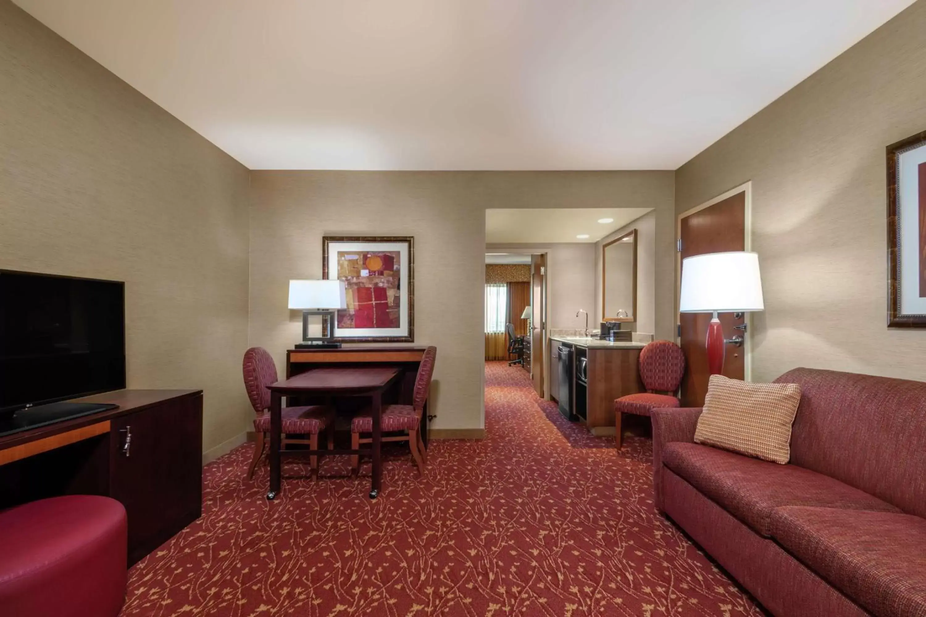 Bedroom, Seating Area in Embassy Suites Loveland Hotel, Spa & Conference Center