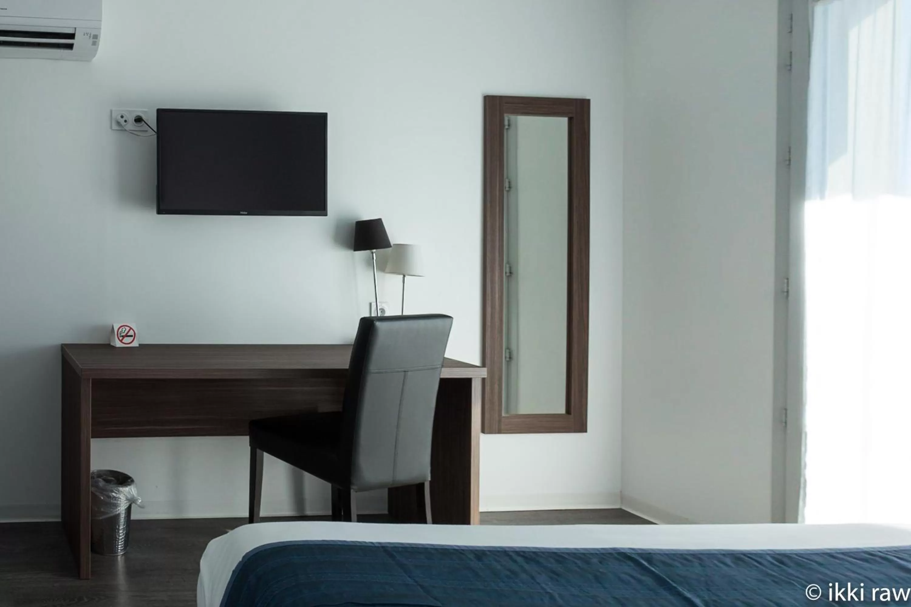 Decorative detail, Bed in Hotel Libera Caen Colombelles