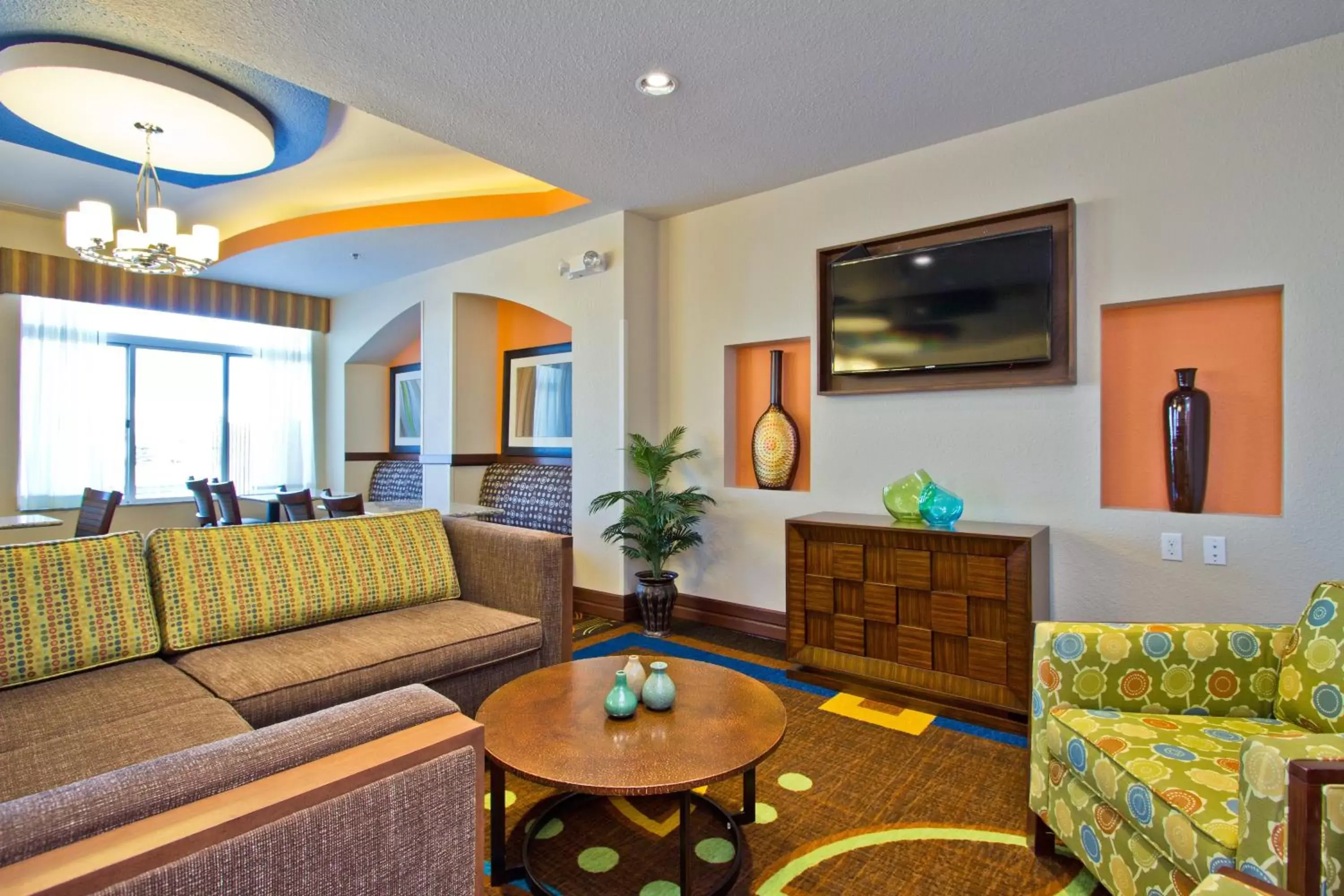 Breakfast, Seating Area in Holiday Inn Express and Suites Denver East Peoria Street, an IHG Hotel