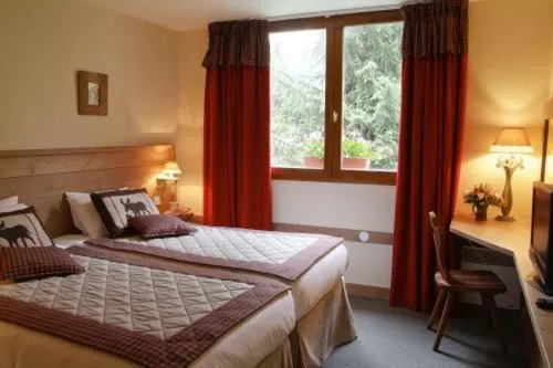 Quadruple Room with Spa Access in Hôtel Restaurant La Tourmaline