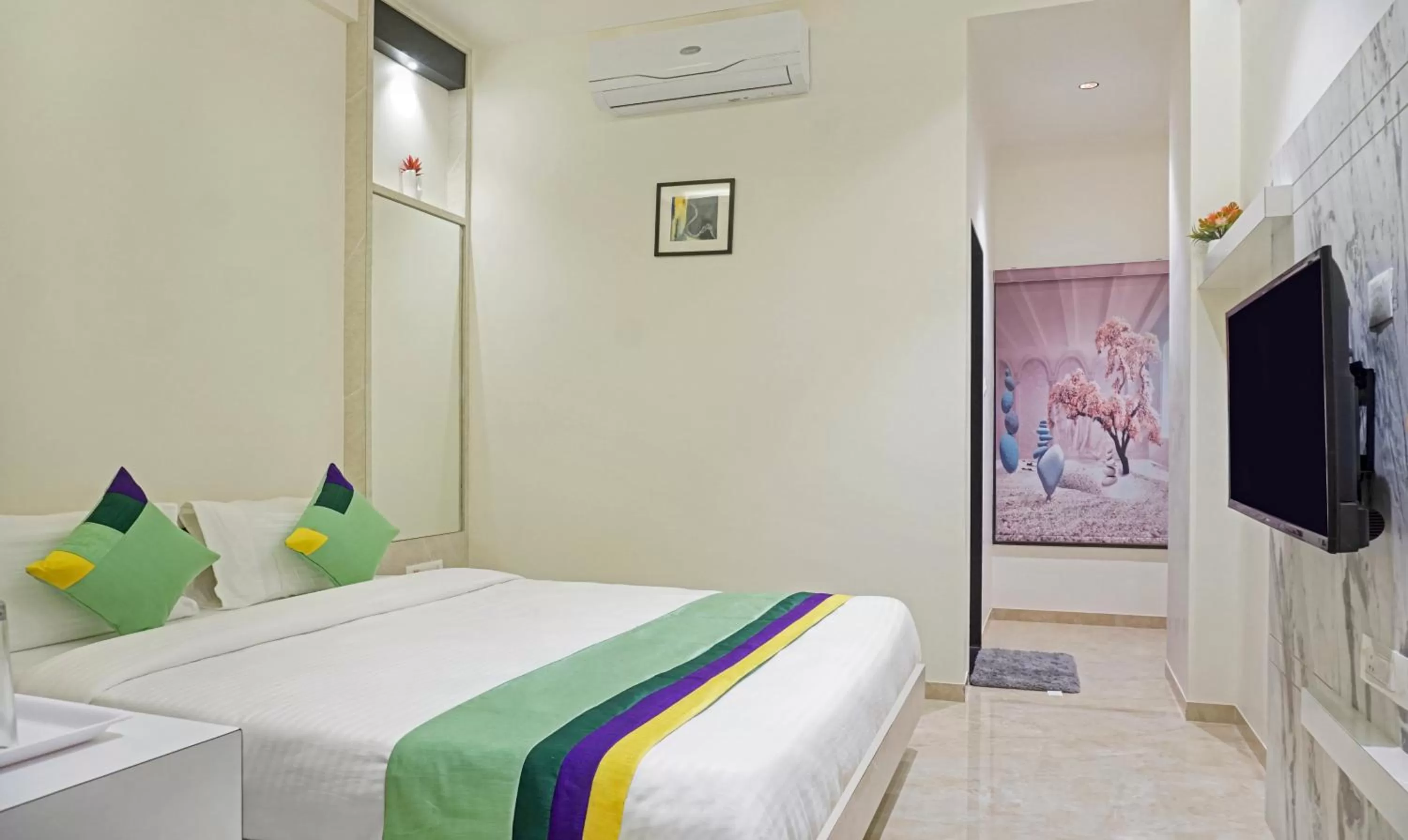 Bedroom, Bed in Treebo The Utsav, Nashik