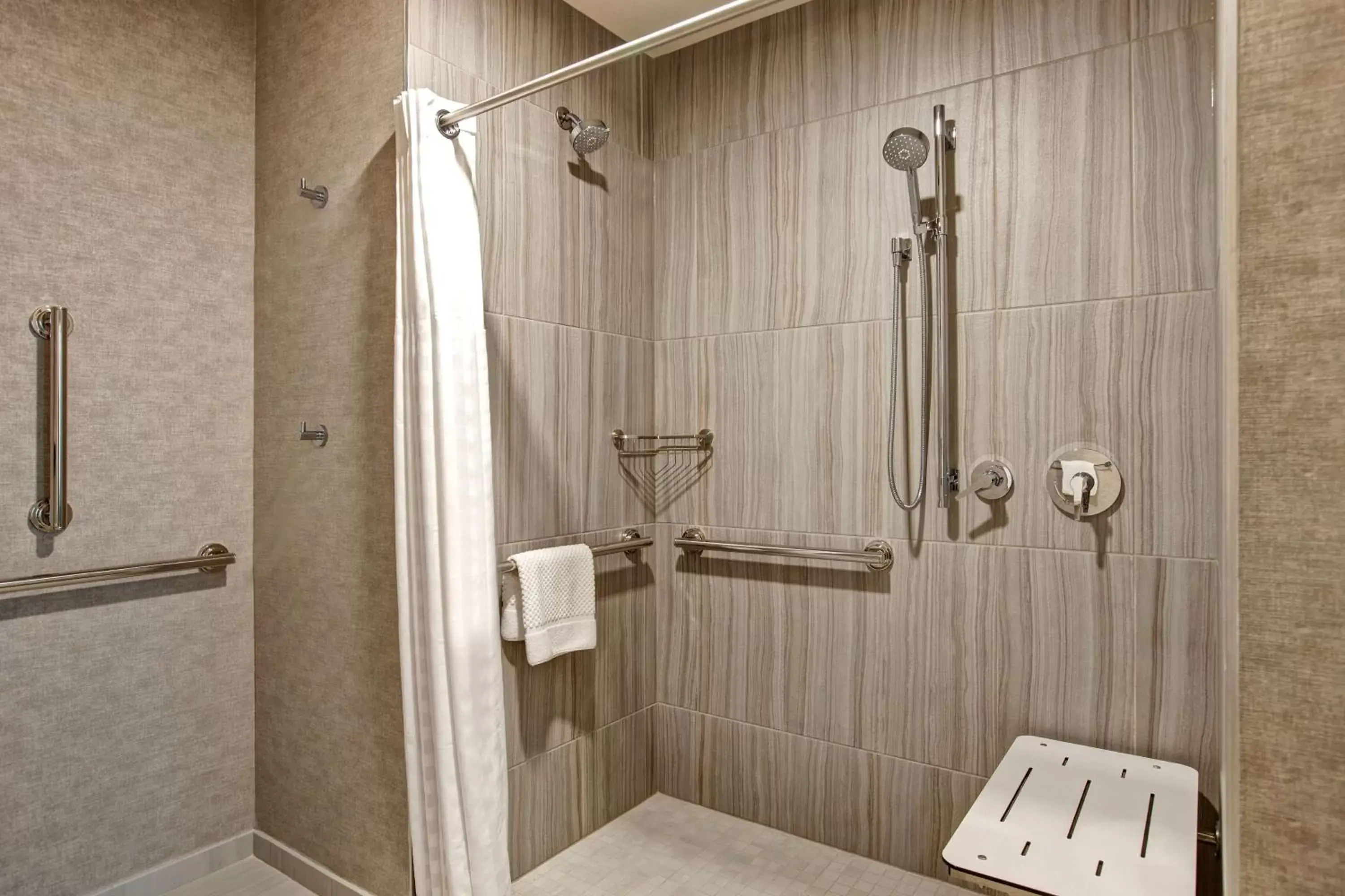 Bathroom in Embassy Suites By Hilton Rockford Riverfront