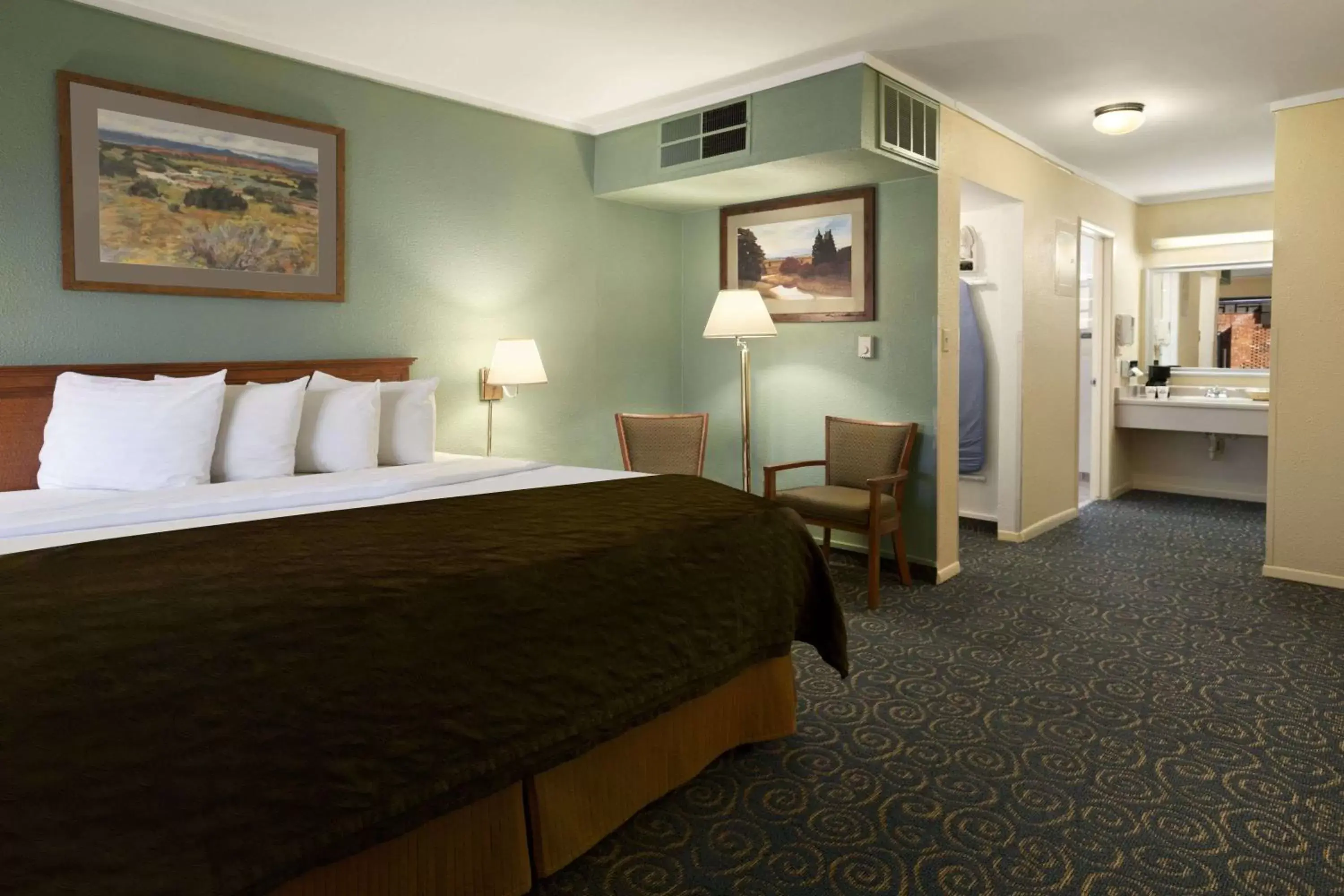 Photo of the whole room, Bed in Days Inn & Suites by Wyndham Trinidad