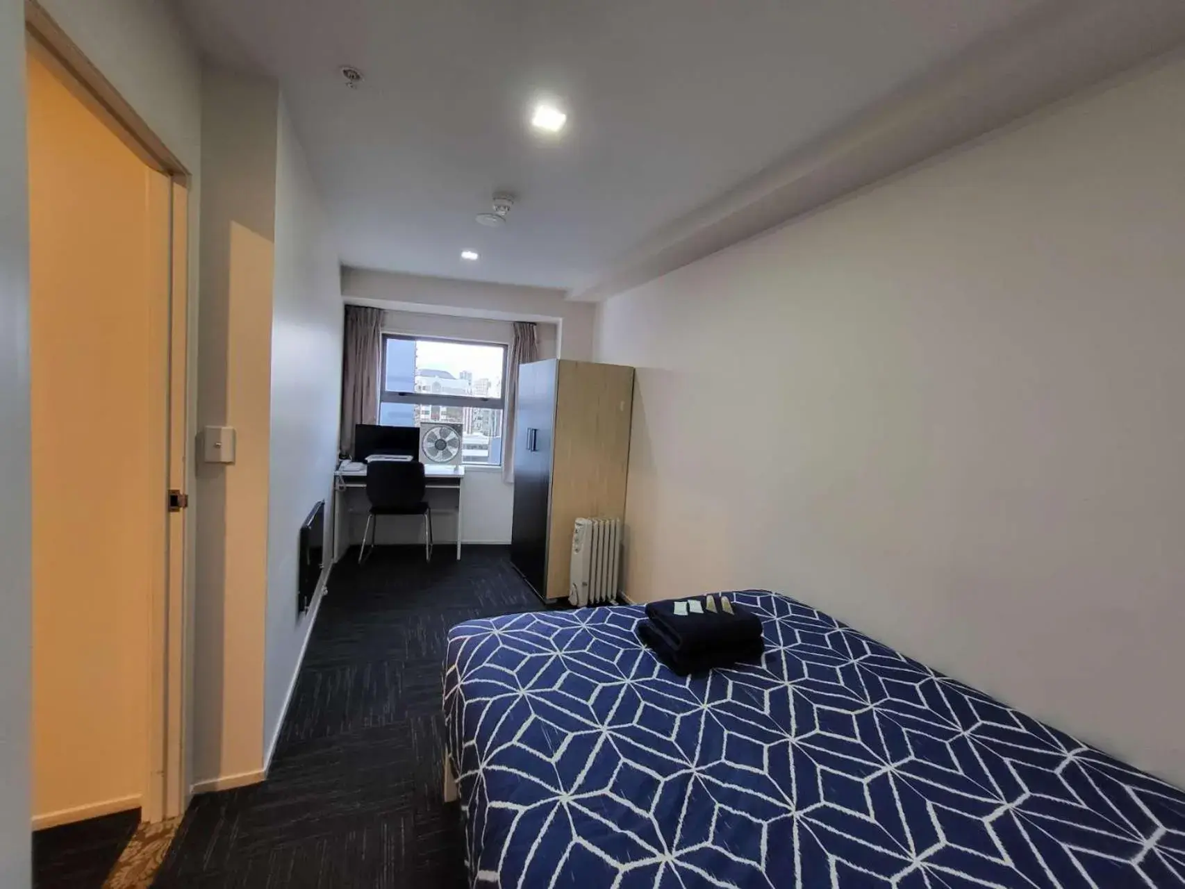 Bed in Empire Apartments Bed in Empire Apartments