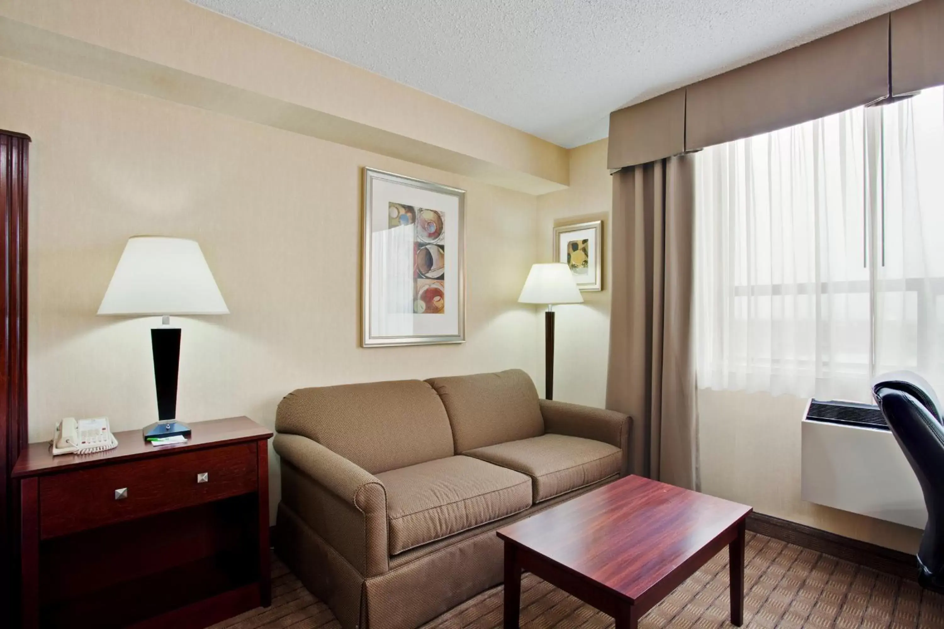 Photo of the whole room, Seating Area in Holiday Inn & Suites Winnipeg Downtown, an IHG Hotel