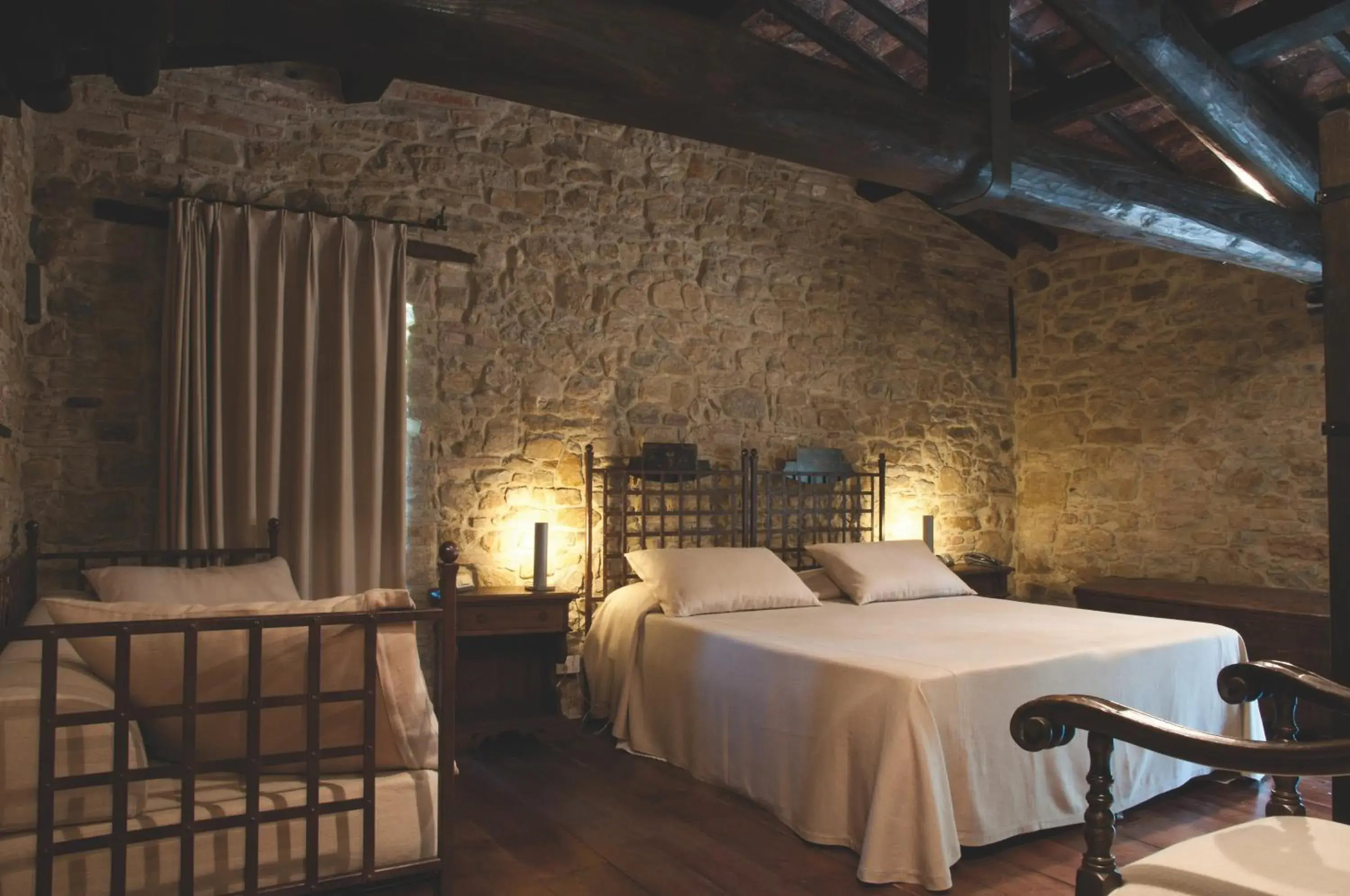 Photo of the whole room, Bed in Castello Di Monterone