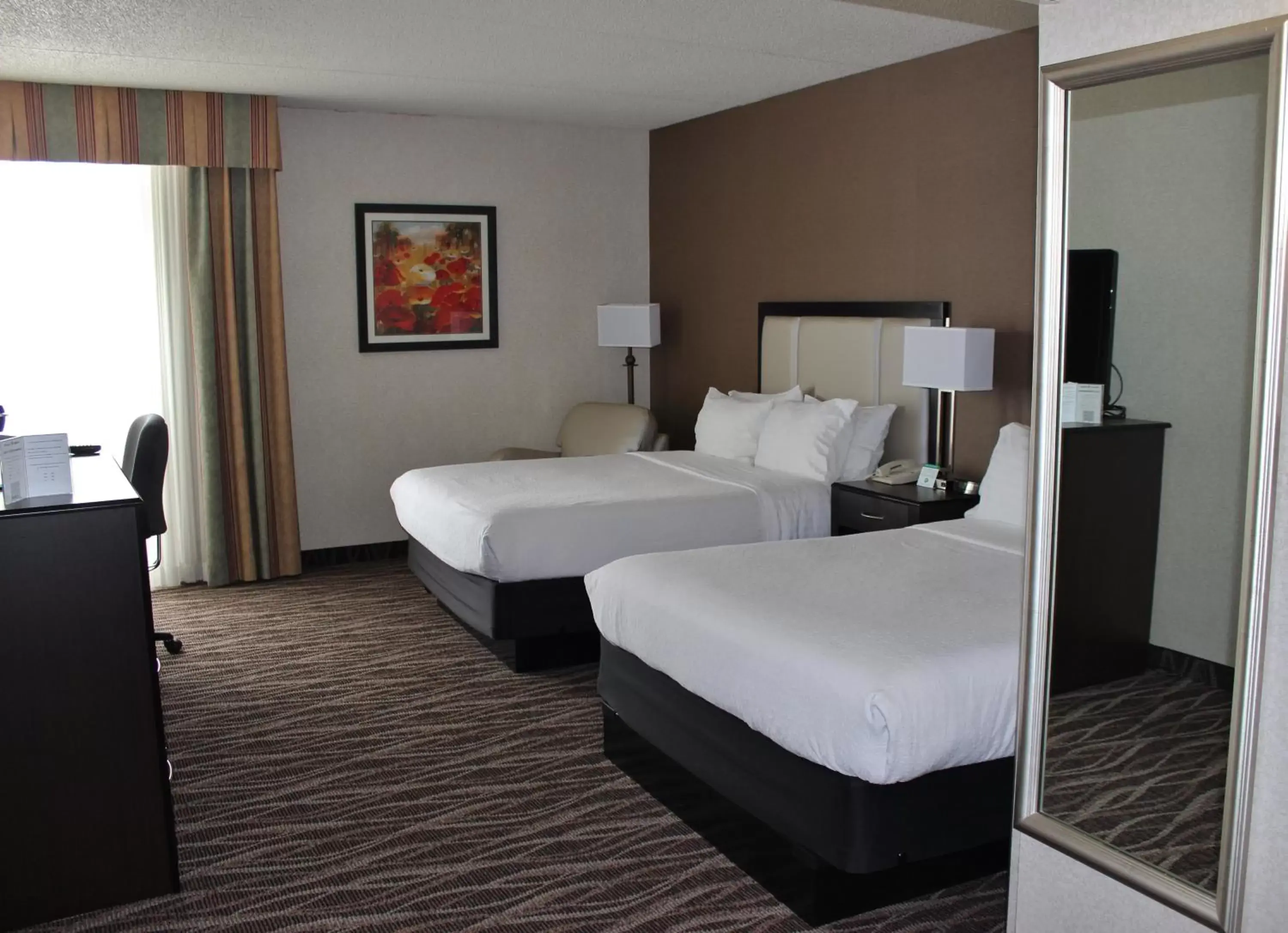 Photo of the whole room, Bed in Holiday Inn Des Moines-Airport Conference Center, an IHG Hotel