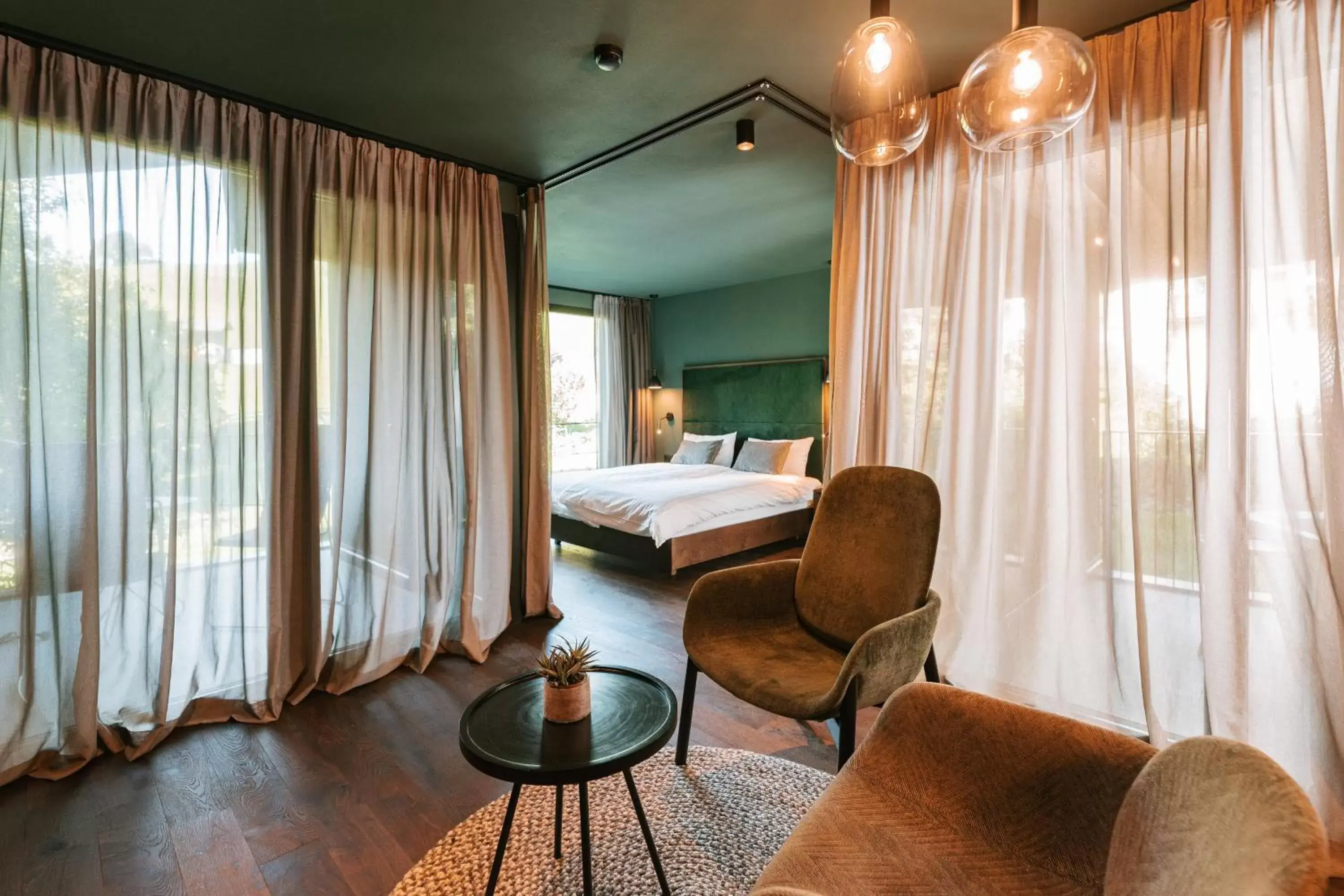 Living room, Bed in Floris Green Suites by Parc Hotel Florian