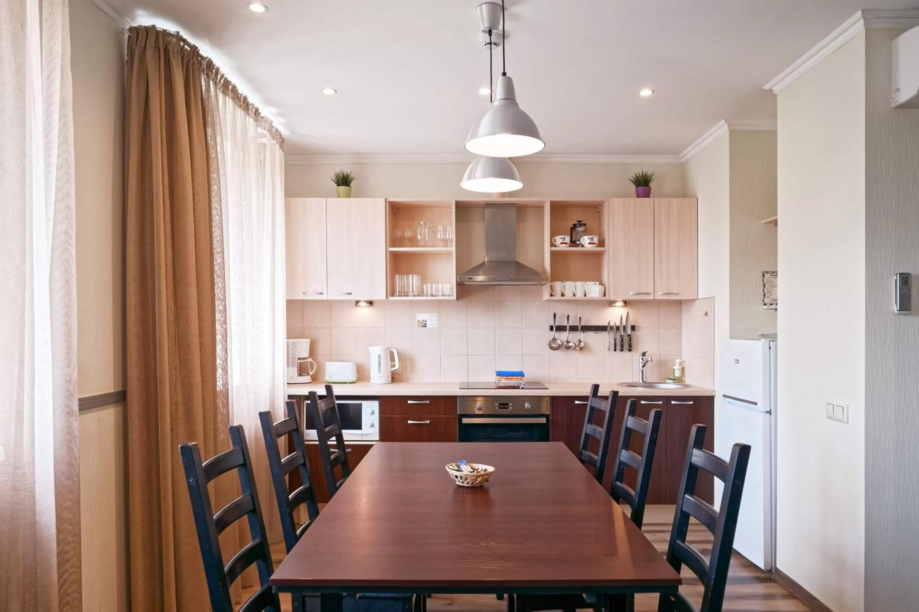 Kitchen or kitchenette in RIGAAPARTMENT SONADA Family Aparthotel - Private Parking