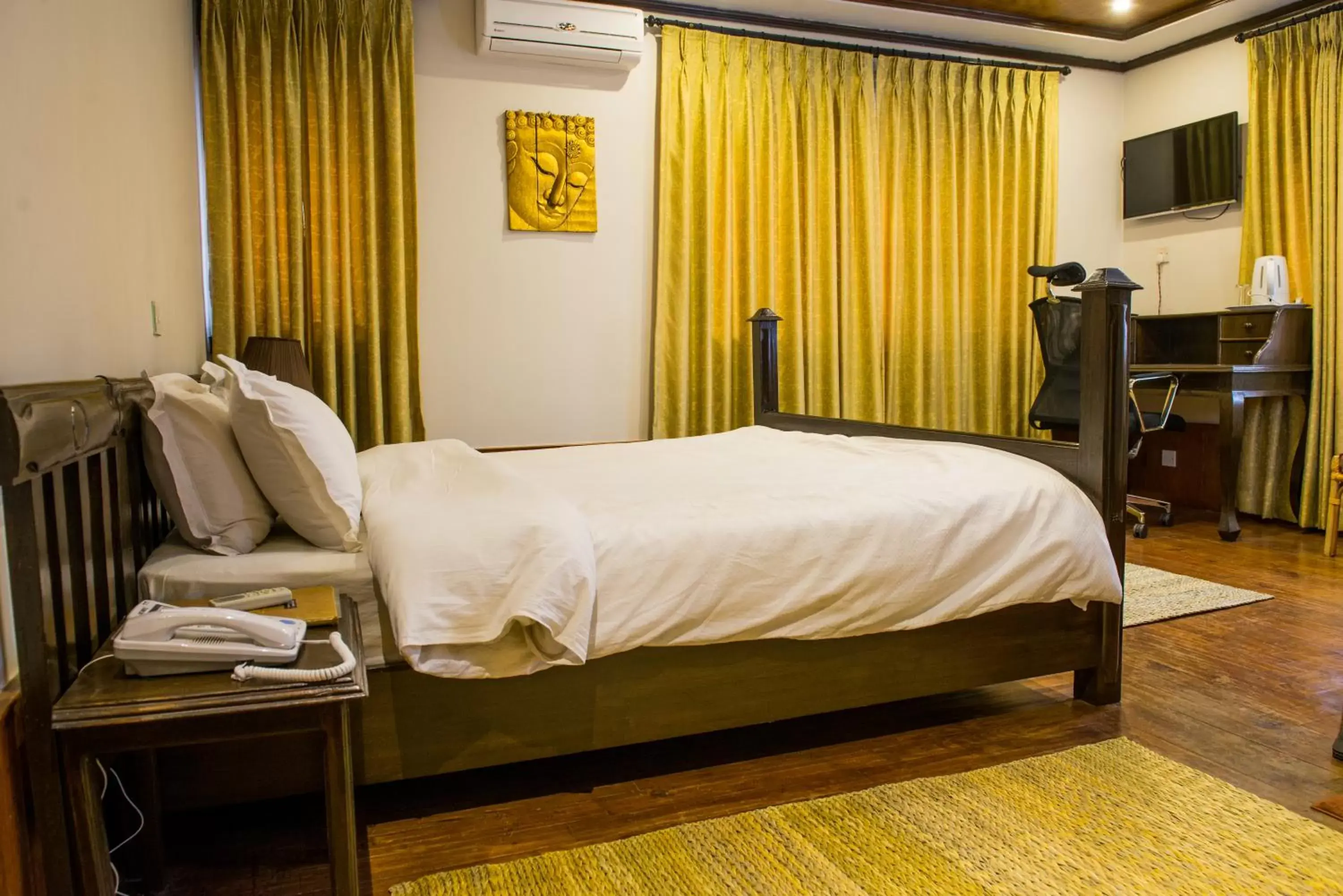 Bed in Hotel Ganesh Himal