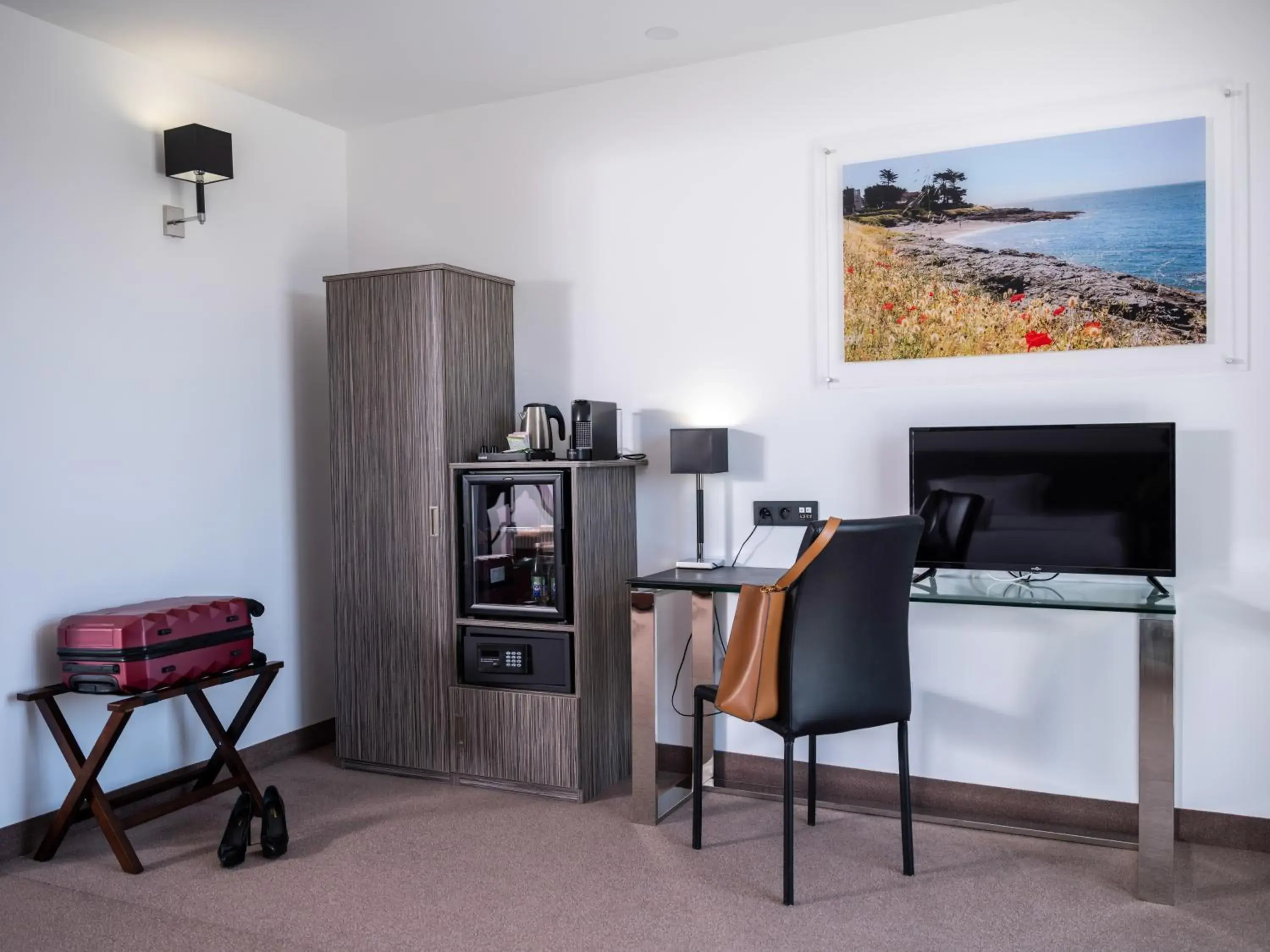 Seating area, TV/Entertainment Center in Golden Tulip La Baule