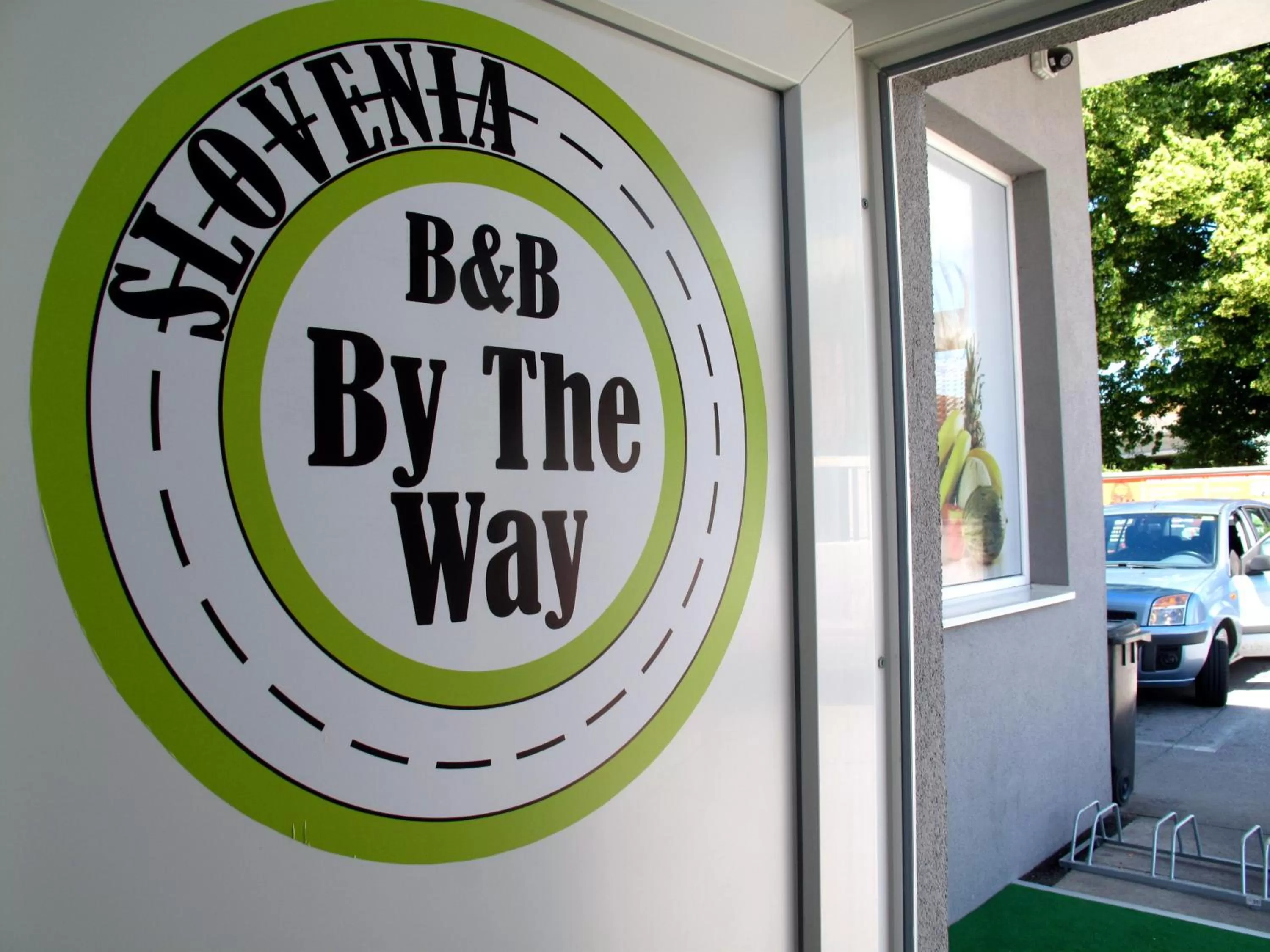 Property logo or sign in B&B By The Way