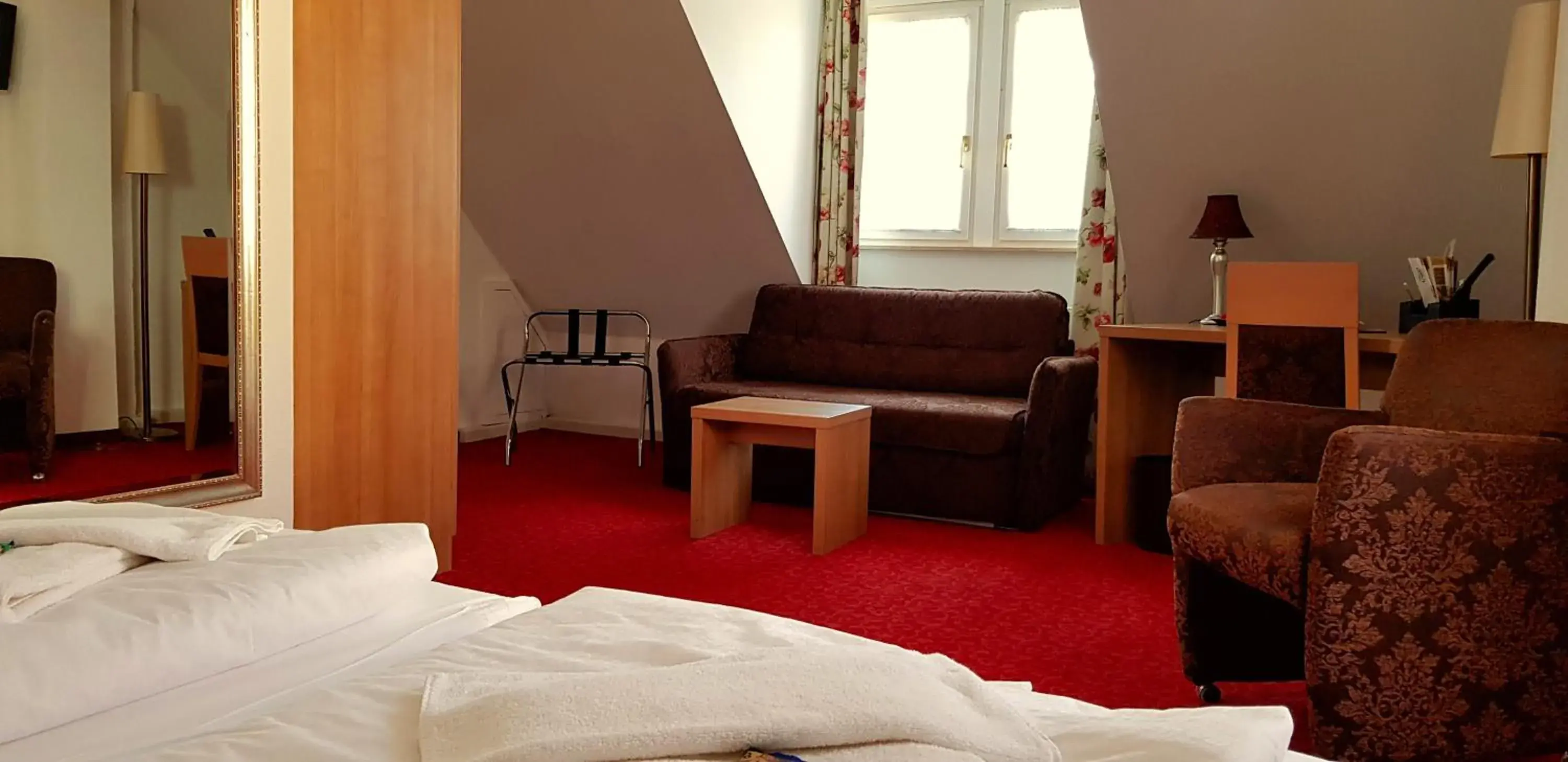 Photo of the whole room, Seating Area in Boutiquehotel Goldene Rose