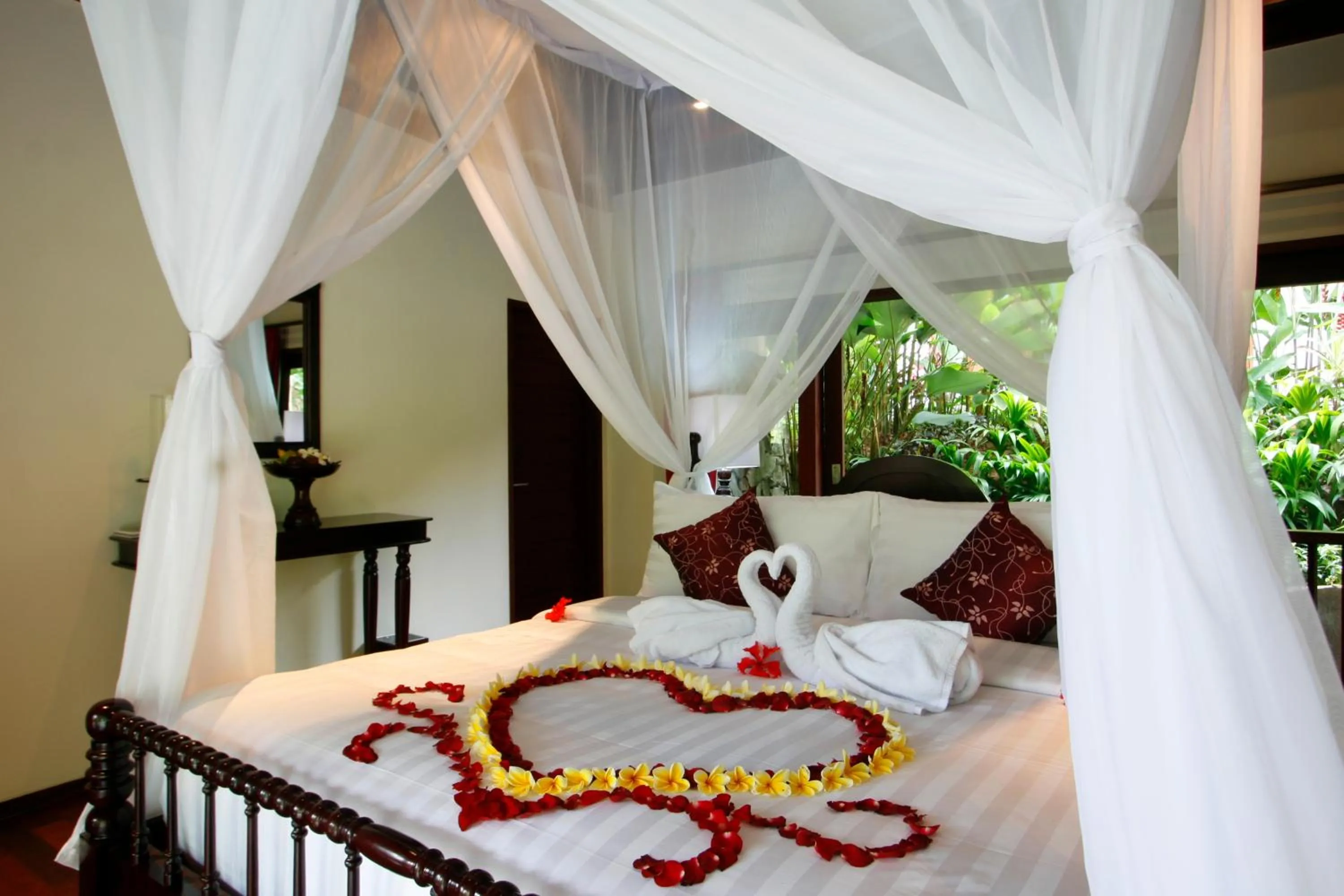 Bed in BeingSattvaa Luxury Ubud