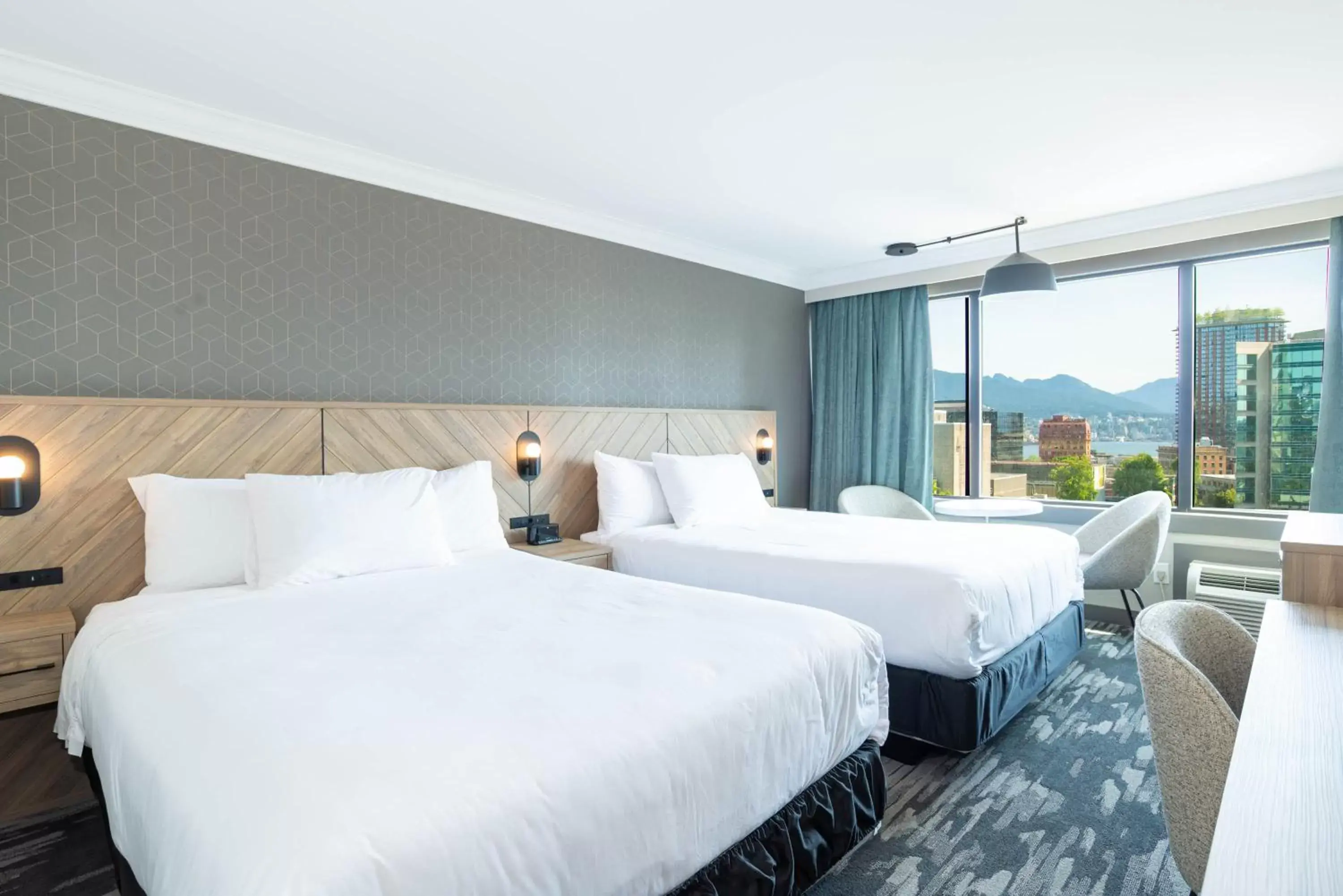 Photo of the whole room, Bed in Sandman Hotel Vancouver Downtown Photo of the whole room, Bed in Sandman Hotel Vancouver Downtown