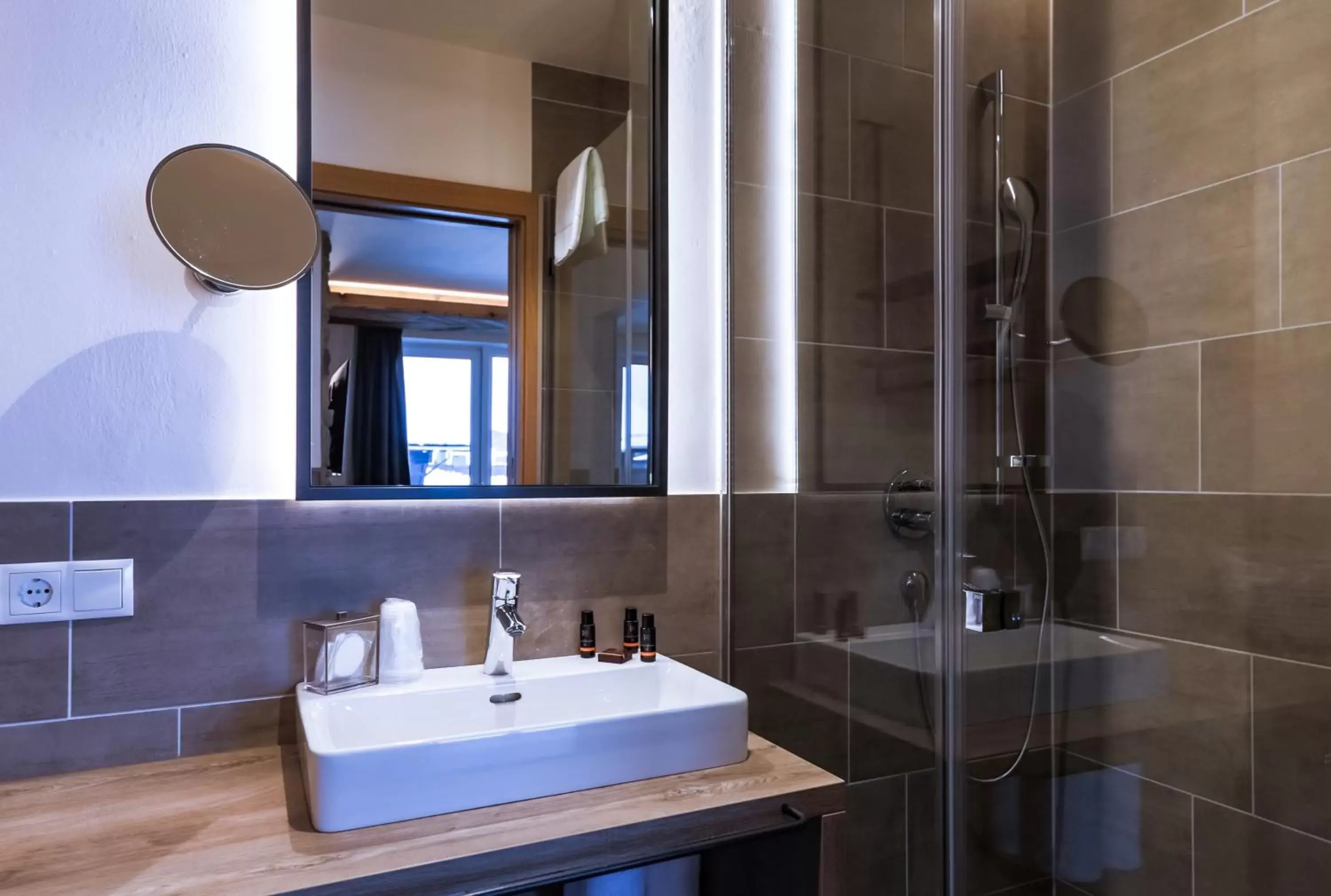Bathroom in 24 by AvenidA Hotel & Residences Kaprun
