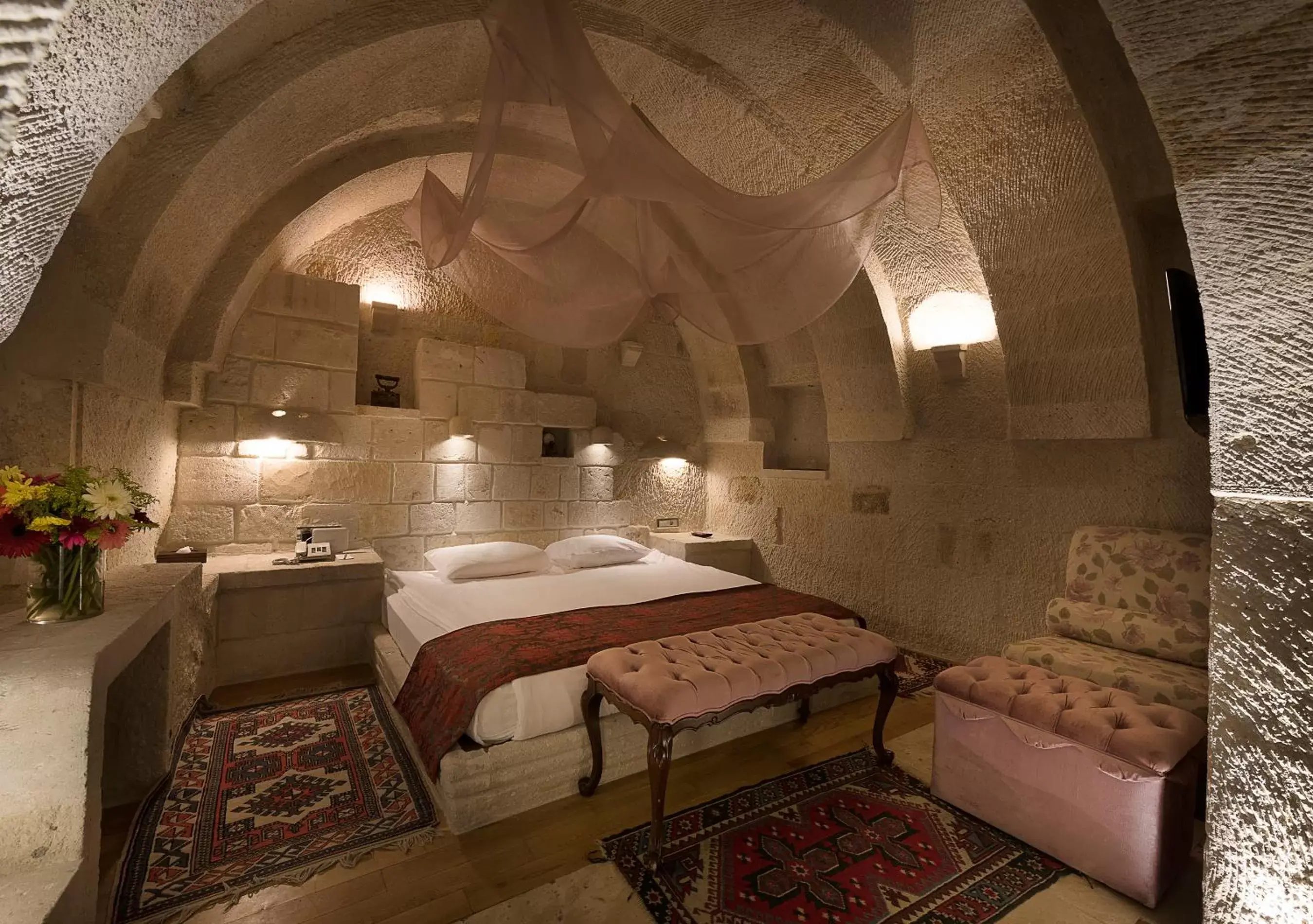 Bed in Anatolian Houses Cave Hotel & SPA